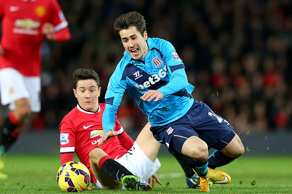 MANCHESTER, ENGLAND - DECEMBER 02:  Ander Herrera of Manchester United challenges Bojan Krkic of Stoke City during the Barclays Premier League match between Manchester United and Stoke City at Old Trafford on December 2, 2014 in Manchester, England.  (Pho