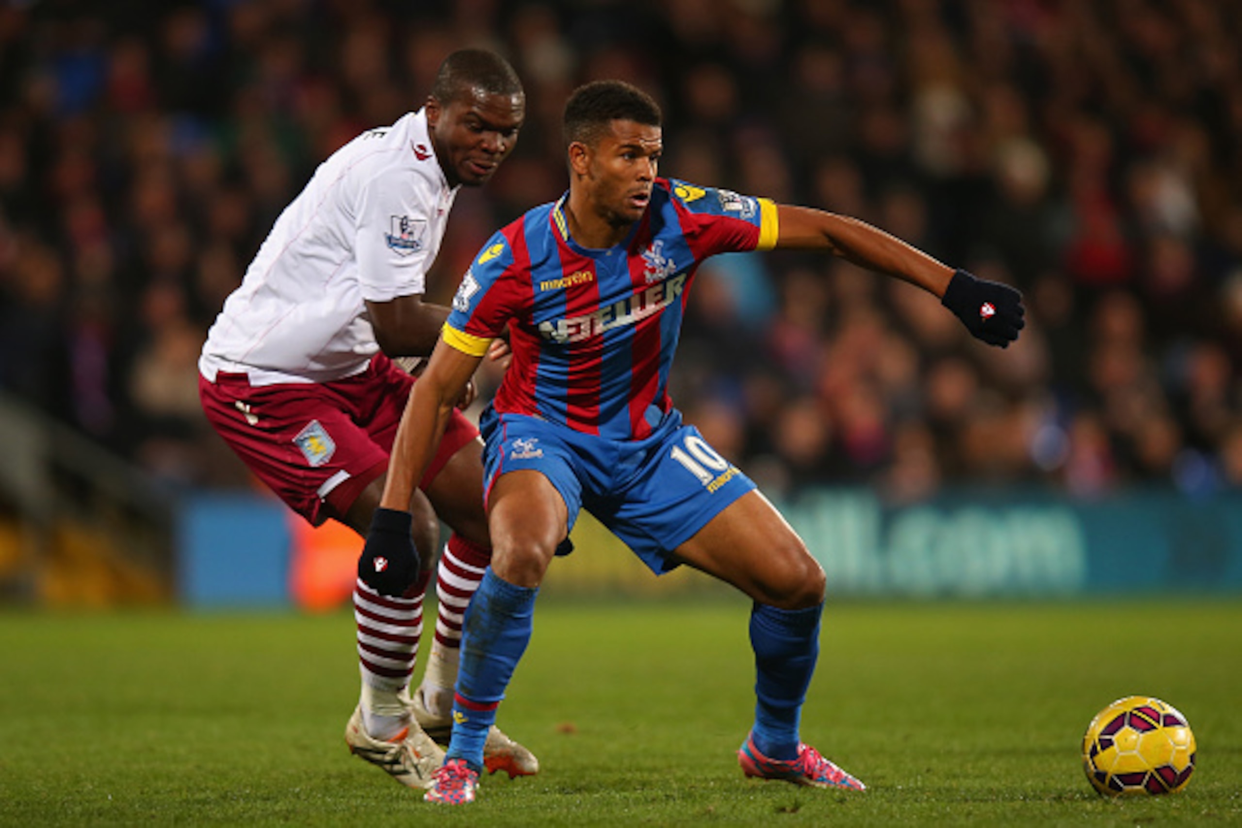 LONDON, ENGLAND - DECEMBER 02:  Frazier Campbell of Crystal Palace (R) is pressured by Jores Okore of Aston Villa during the Barclays Premier League match between Crystal Palace and Aston Villa at Selhurst Park on December 2, 2014 in London, England.  (Ph