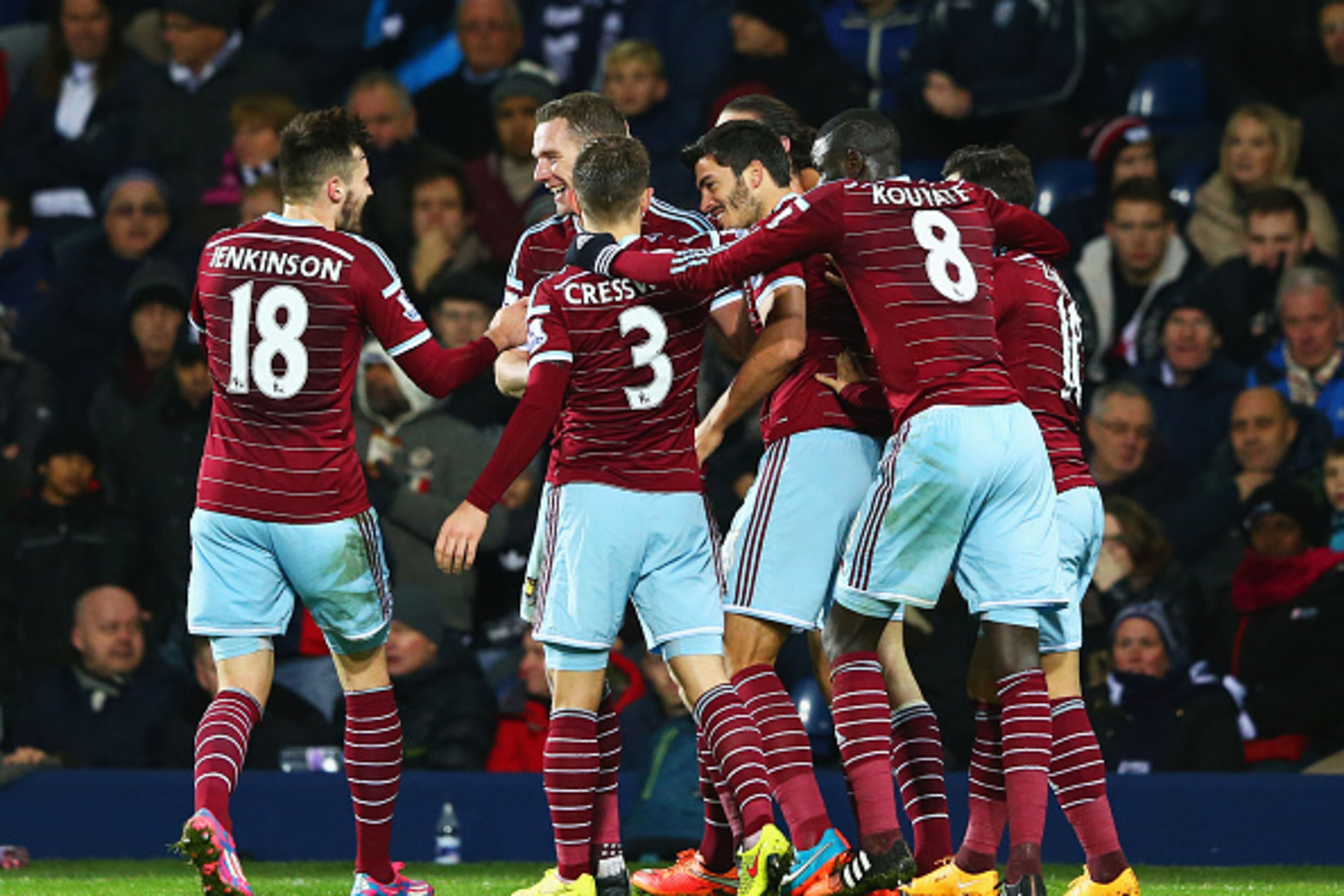 WEST BROMWICH, ENGLAND - DECEMBER 02:  James Tomkins of West Ham United (3R) celebrates with team mates as he scores their second goal during the Barclays Premier League match between West Bromwich Albion and West Ham United at The Hawthorns on December 2