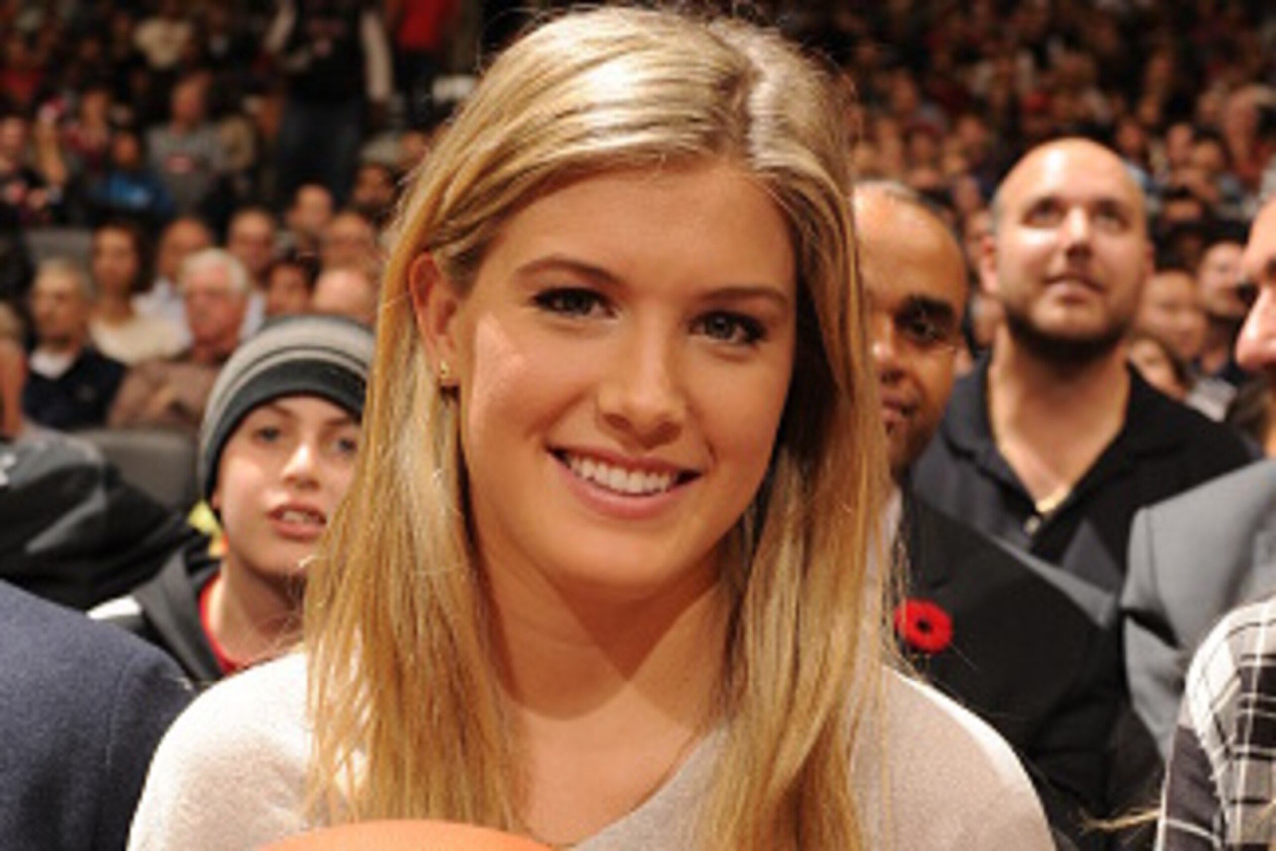 TORONTO, ON - NOVEMBER 11:  Canadian tennis player Eugenie Bouchard attends the game between the Orlando Magic and Toronto Raptors on November 11, 2014 at the Air Canada Centre in Toronto, Ontario, Canada. NOTE TO USER: User expressly acknowledges and agr