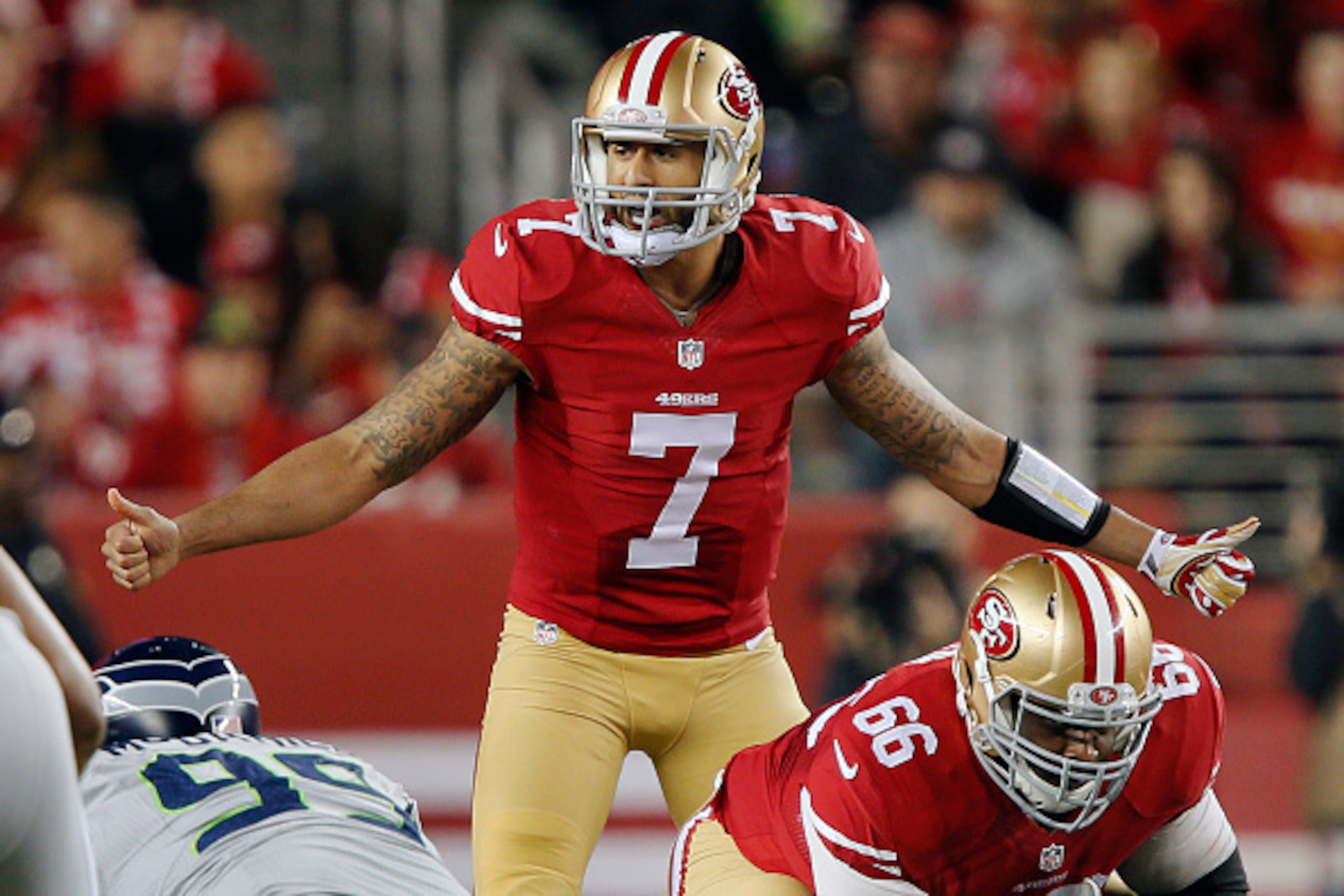 SANTA CLARA, CA - NOVEMBER 27:  Quarterback Colin Kaepernick #7 of the San Francisco 49ers calls out a play against the Seattle Seahawks on the first play from scrimmage on November 27, 2014 at Levi's Stadium in Santa Clara, California.  The Seahawks won 