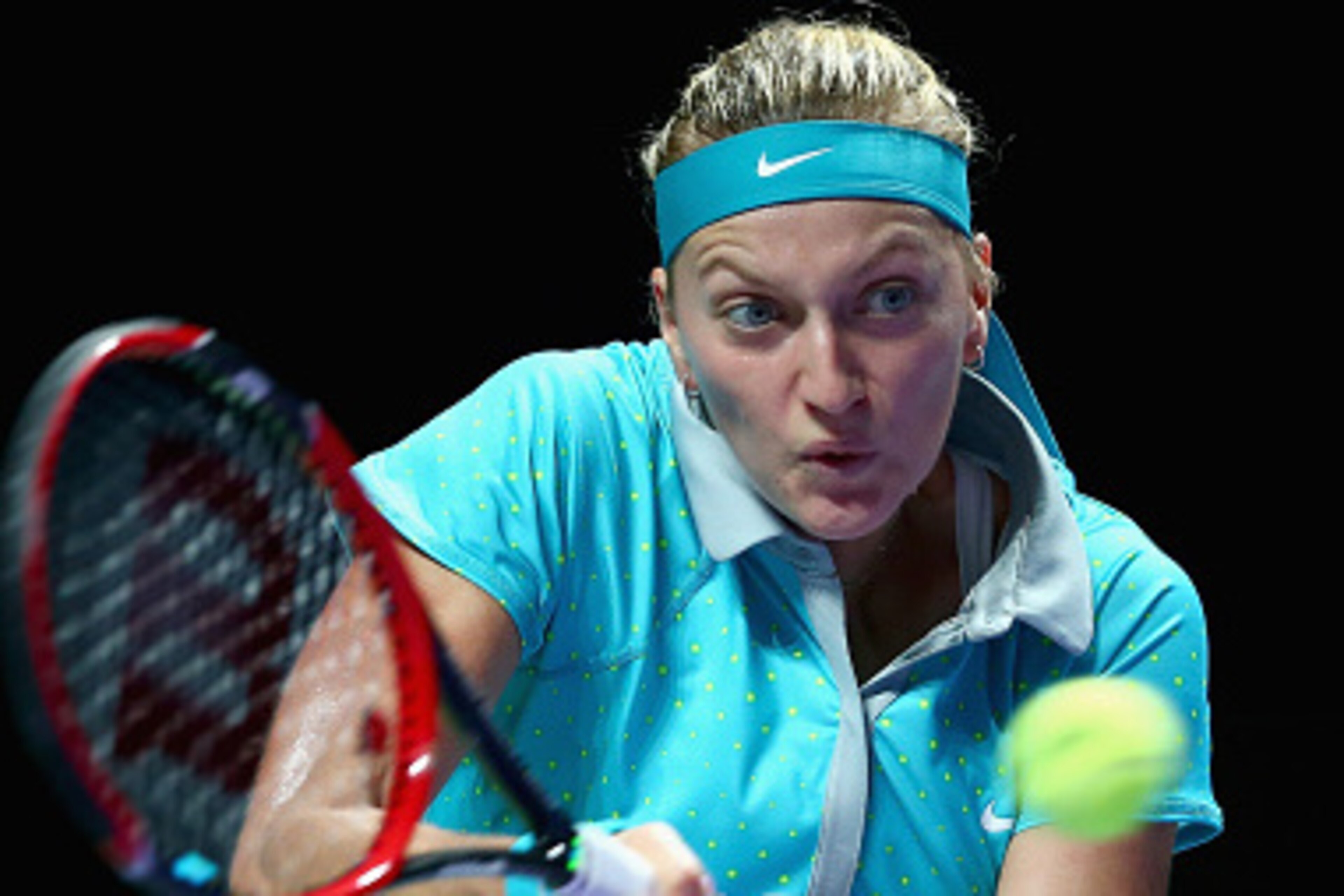 SINGAPORE - OCTOBER 24: Petra Kvitova of the Czech Republic plays a forehand against Caroline Wozniacki of Denmark in their round robin match during the BNP Paribas WTA Finals at Singapore Sports Hub on October 24, 2014 in Singapore. (Photo by Clive Bru SINGAPORE - OCTOBER 24: Petra Kvitova of the Czech Republic plays a forehand against Caroline Wozniacki of Denmark in their round robin match during the BNP Paribas WTA Finals at Singapore Sports Hub on October 24, 2014 in Singapore. (Photo by Clive Bru