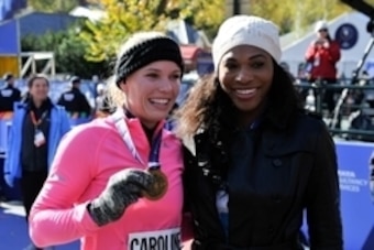 Nov 2, 2014; New York, NY, USA; Tennis star Caroline Wozniacki celebrates with close friend, tennis star Serena Williams after she finished the 2014 TCS New York City Marathon. Mandatory Credit: Derik Hamilton-USA TODAY Sports
