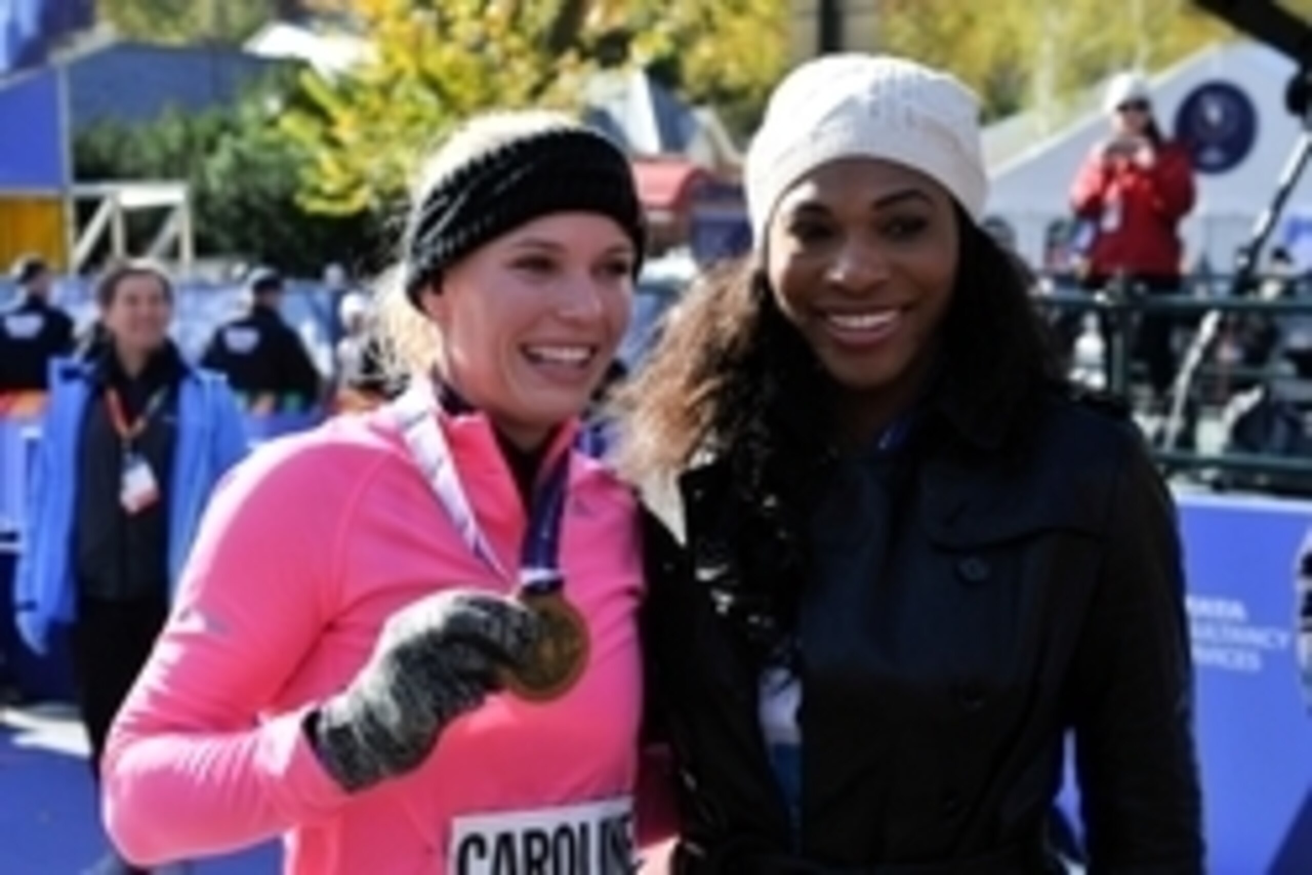 Nov 2, 2014; New York, NY, USA; Tennis star Caroline Wozniacki celebrates with close friend, tennis star Serena Williams after she finished the 2014 TCS New York City Marathon. Mandatory Credit: Derik Hamilton-USA TODAY Sports