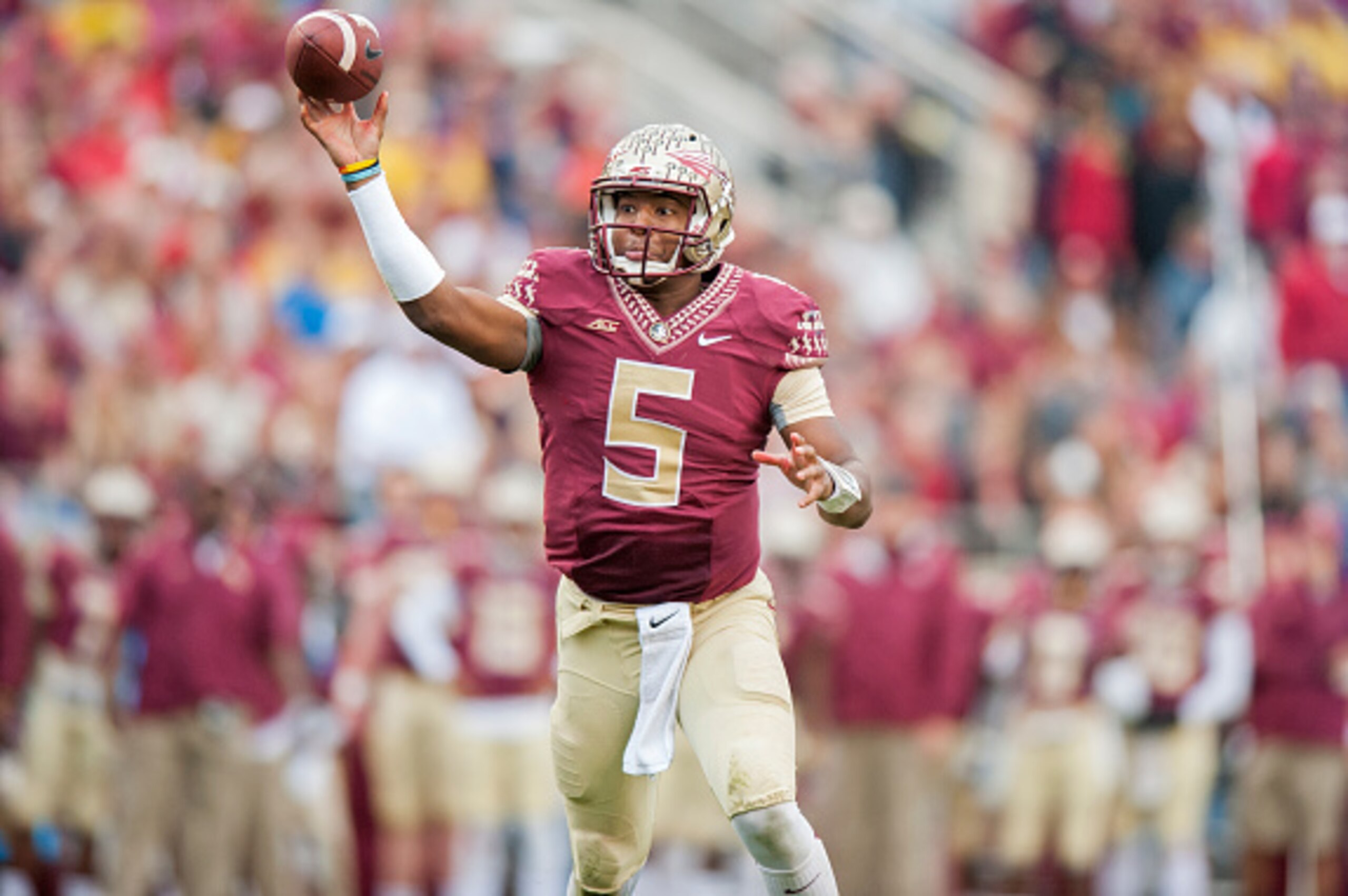 TALLAHASSEE, FL - NOVEMBER 22: Quarterback Jameis Winston #5 of the Florida State Seminoles makes a pass against the Boston College Eagles during the first half at Doak Campbell Stadium on November 22, 2014 in Tallahassee, Florida. (Photo by Jeff Gammons/