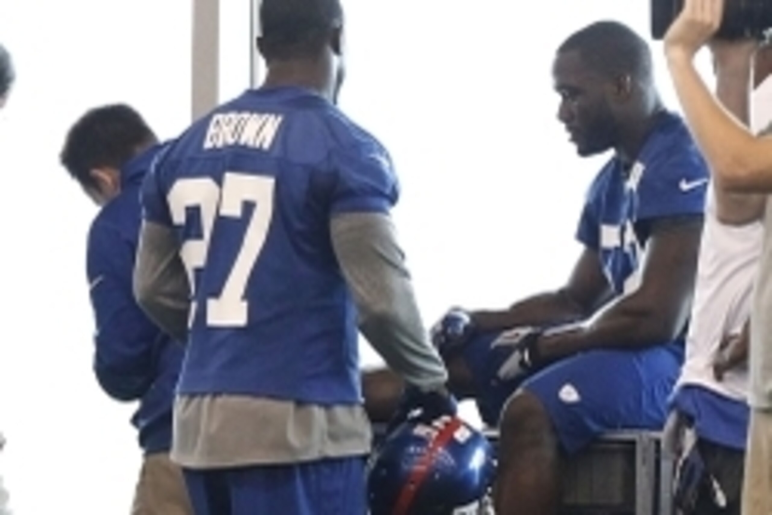 Jun 12, 2014; East Rutherford, NJ, USA; New York Giants outside linebacker Jon Beason (52) is tended to on the sidelines during New York Giants minicamp at the Quest Diagnostics Training Center. William Perlman/The Star-Ledger-USA TODAY Sports