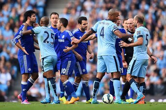 MANCHESTER, ENGLAND - SEPTEMBER 21:   Pablo Zabaleta of Manchester City is separated from Diego Costa of Chelsea by his team-mates during the Barclays Premier League match between Manchester City and Chelsea at the Etihad Stadium on September 21, 2014 in 