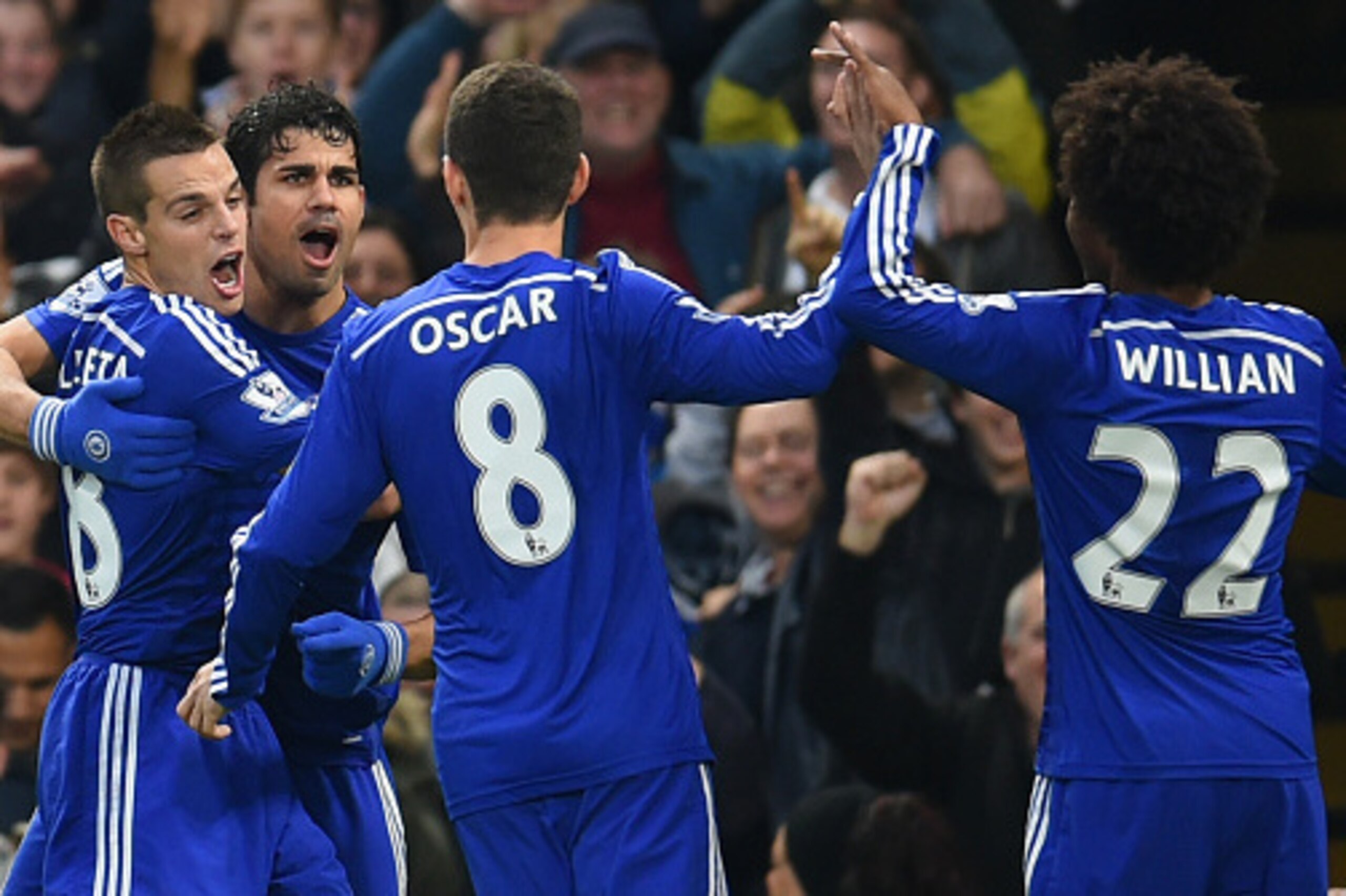 LONDON, ENGLAND - NOVEMBER 22:  Diego Costa of Chelsea celebrates scoring opening goal with team mates during the Barclays Premier League match between Chelsea and West Bromwich Albion at Stamford Bridge on November 22, 2014 in London, England.  (Photo by