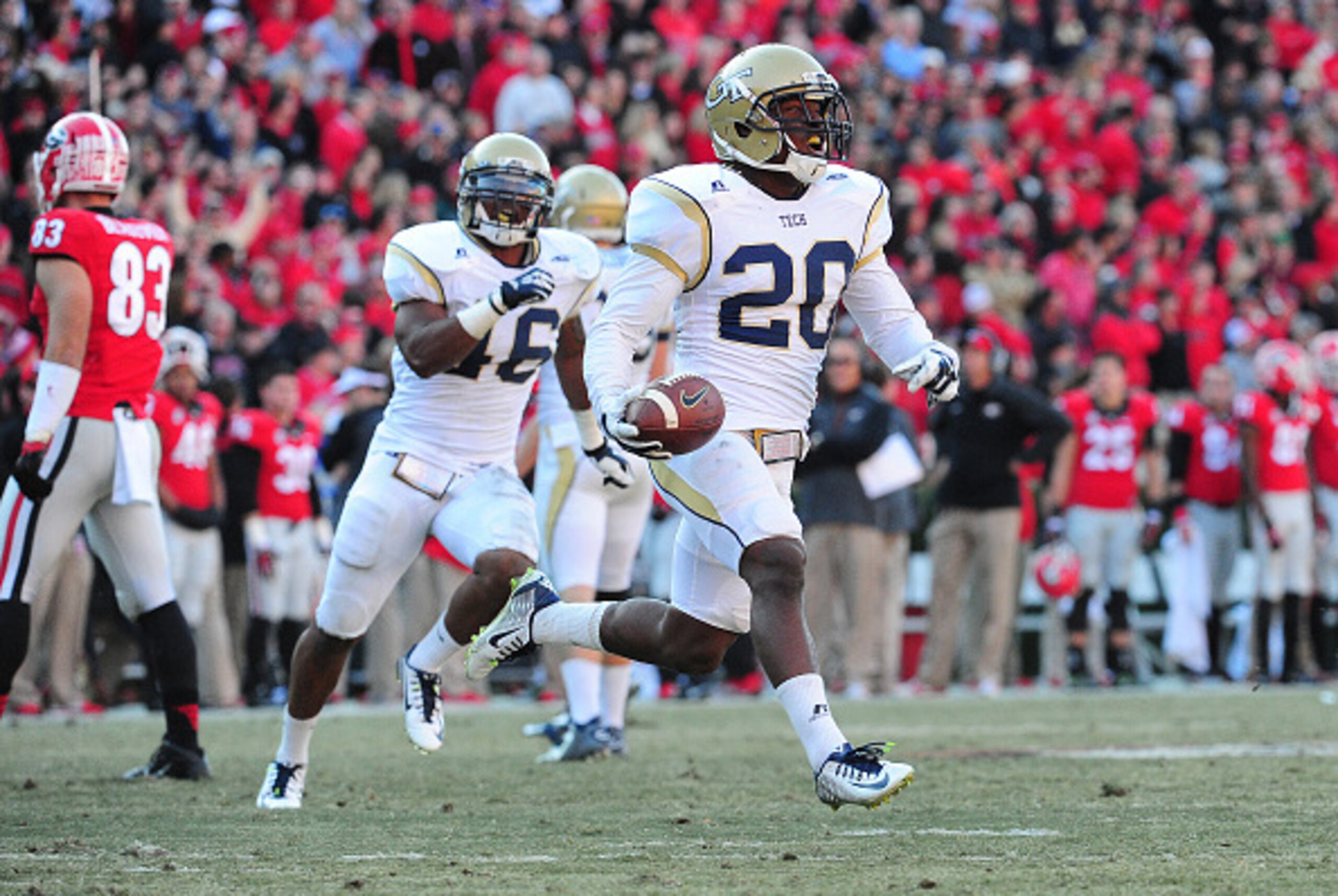 ATHENS, GA - NOVEMBER 29: Lawrence Austin #20 of the Georgia Tech Yellow Jackets celebrates after recovering an onsides kick against the Georgia Bulldogs at Sanford Stadium on November 29, 2014 in Athens, Georgia. (Photo by Scott Cunningham/Getty Images)