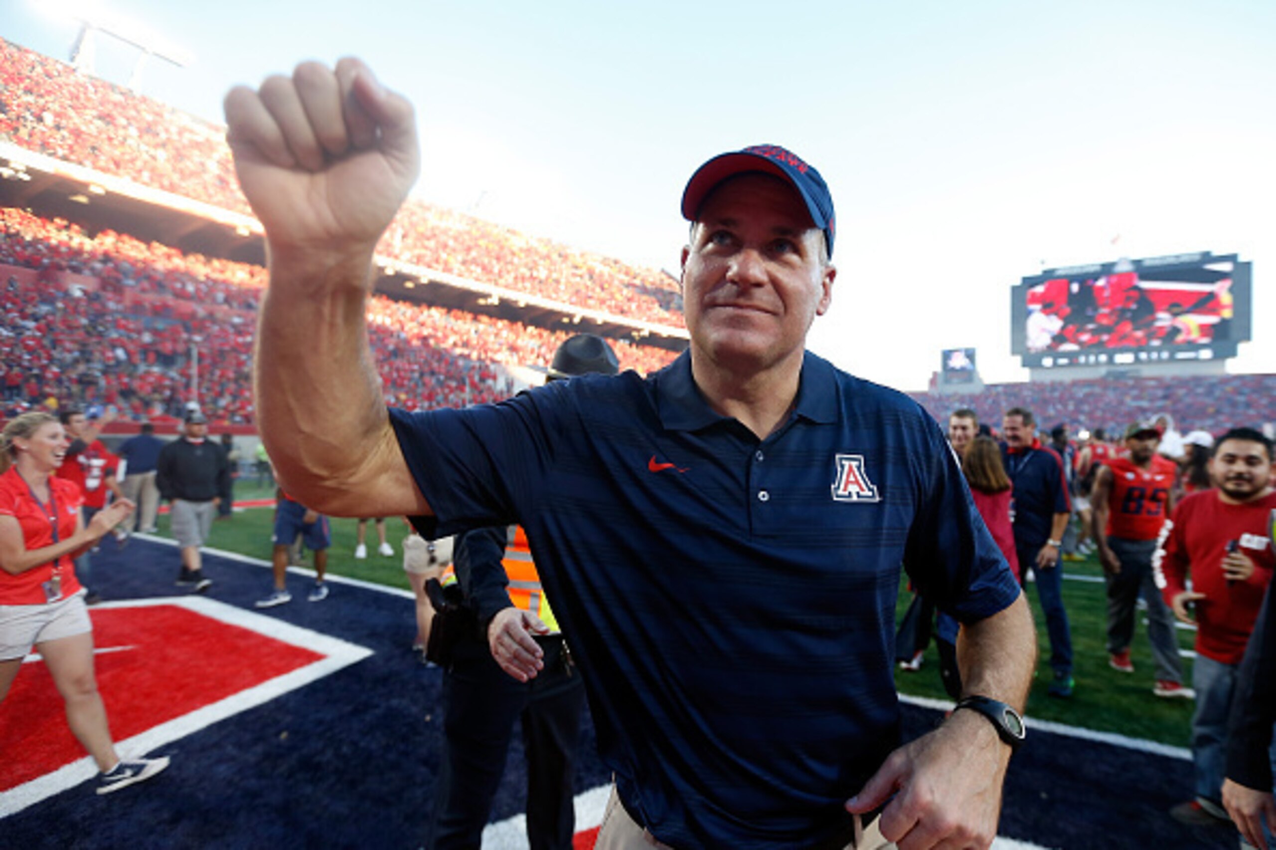 TUCSON, AZ - NOVEMBER 28:  Head coach Rich Rodriguez of the Arizona Wildcats celebrates after defeating the Arizona State Sun Devils 42-35 to win the PAC-12 south championship following the Territorial Cup college football game at Arizona Stadium on Novem