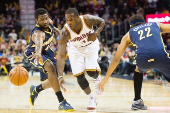 CLEVELAND, OH - NOVEMBER 29: Solomon Hill #44 and Chris Copeland #22 of the Indiana Pacers fight for a loose ball with Dion Waiters #3 of the Cleveland Cavaliers during the second half at Quicken Loans Arena on November 29, 2014 in Cleveland, Ohio. The Ca