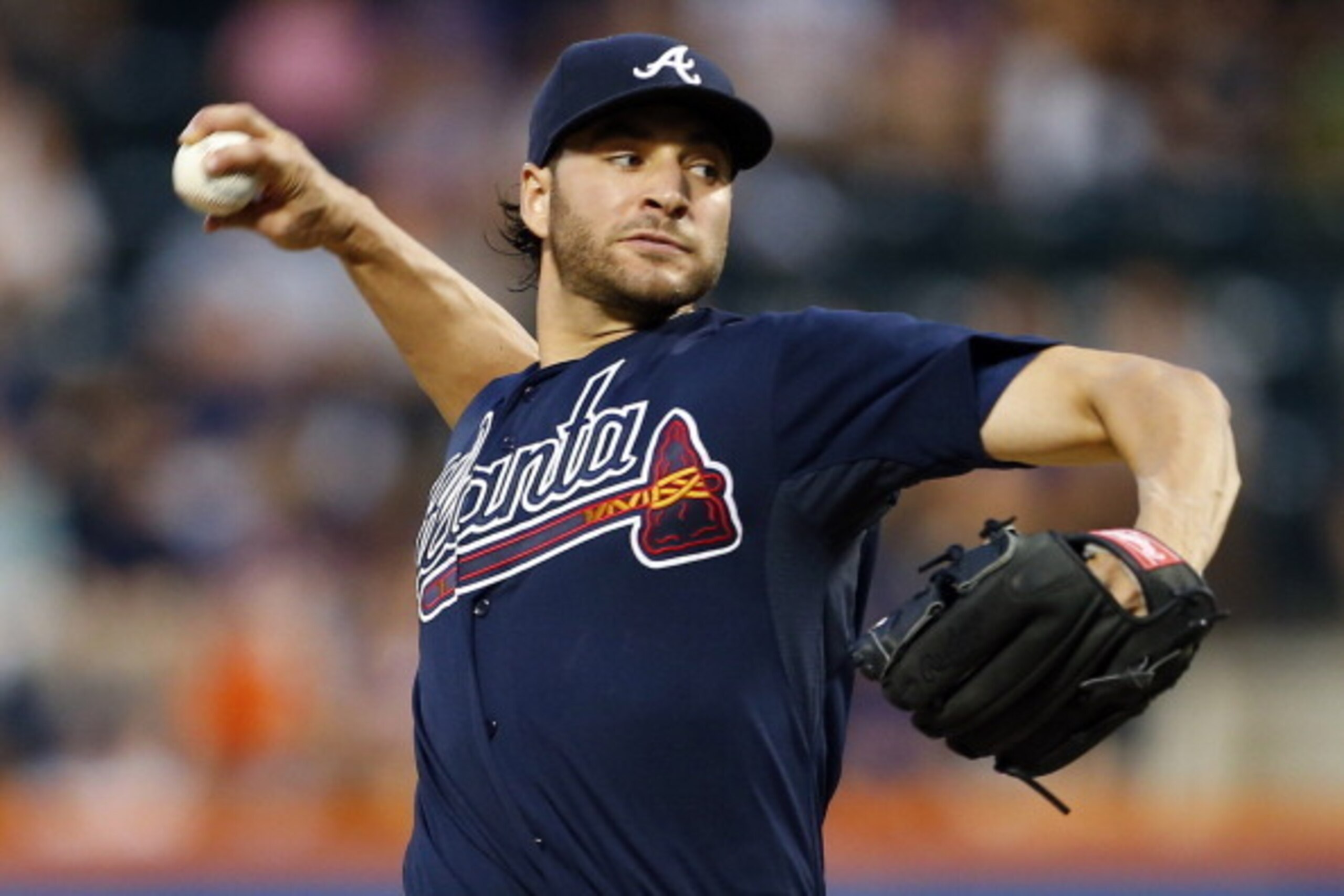 NEW YORK, NY - AUGUST 20: Pitcher Brandon Beachy #37 of the Atlanta Braves delivers a pitch against the New York Mets during a game on August 20, 2013 at Citi Field in the Flushing neighborhood of the Queens borough of New York City. (Photo by Rich Schult