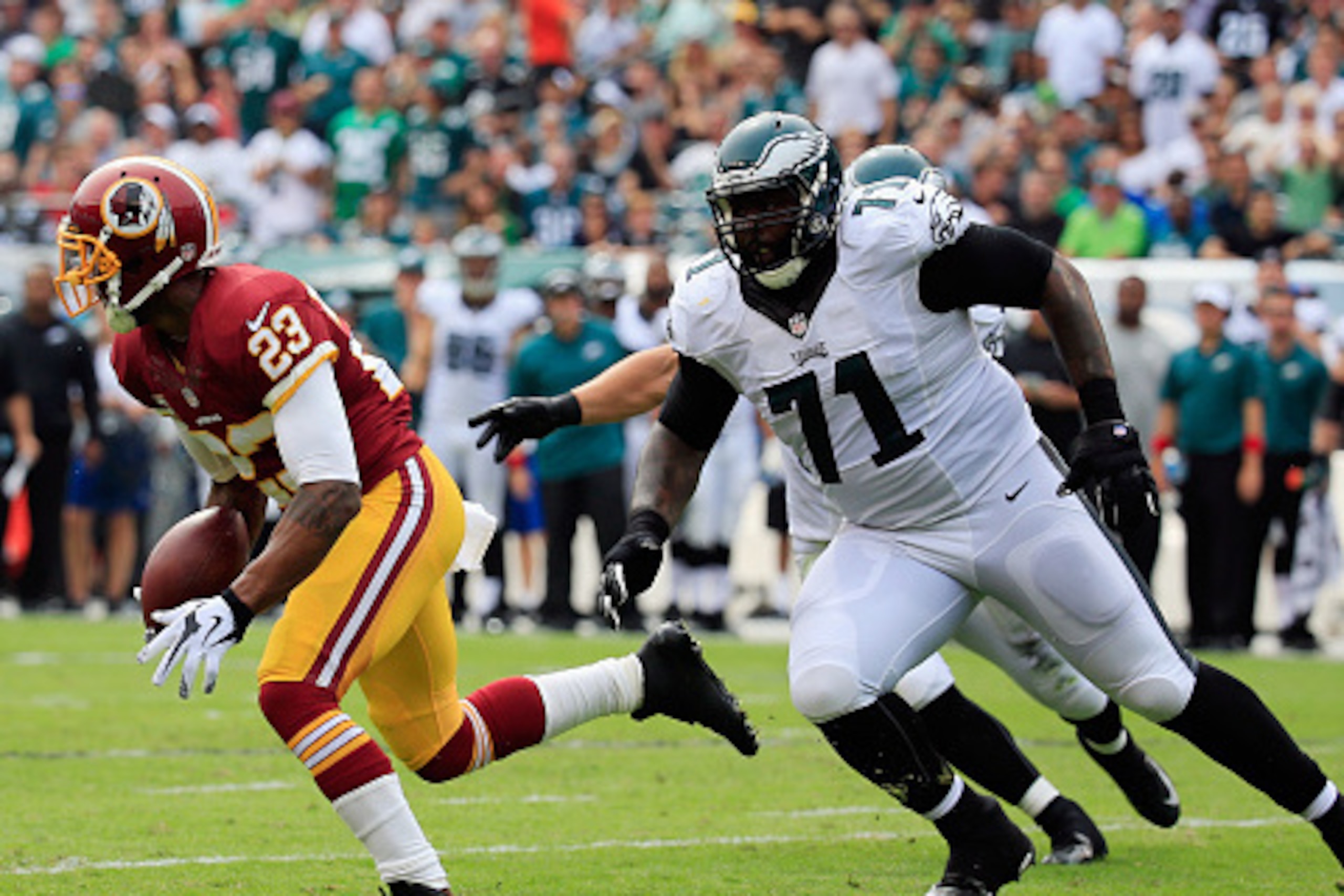 PHILADELPHIA, PA - SEPTEMBER 21: DeAngelo Hall #23 of the Washington Redskins returns a fumble in the second quarter against Jason Peters #71 of the Philadelphia Eagles at Lincoln Financial Field on September 21, 2014 in Philadelphia, Pennsylvania. (Ph PHILADELPHIA, PA - SEPTEMBER 21: DeAngelo Hall #23 of the Washington Redskins returns a fumble in the second quarter against Jason Peters #71 of the Philadelphia Eagles at Lincoln Financial Field on September 21, 2014 in Philadelphia, Pennsylvania. (Ph