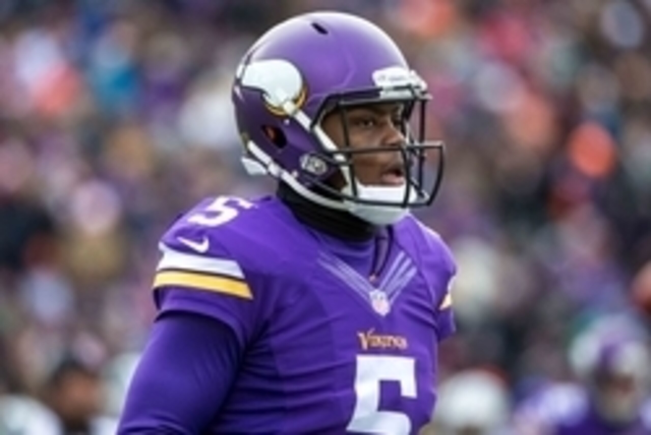 Nov 30, 2014; Minneapolis, MN, USA; Minnesota Vikings quarterback Teddy Bridgewater (5) looks on during the second quarter against the Carolina Panthers at TCF Bank Stadium. The Vikings defeated the Panthers 31-13. Mandatory Credit: Brace Hemmelgarn-USA T