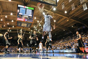 DURHAM, NC - NOVEMBER 30:  Jahlil Okafor #15 of the Duke Blue Devils goes up for a dunk against the Army Black Knights during a game at Cameron Indoor Stadium on November 30, 2014 in Durham, North Carolina. (Photo by Lance King/Getty Images)