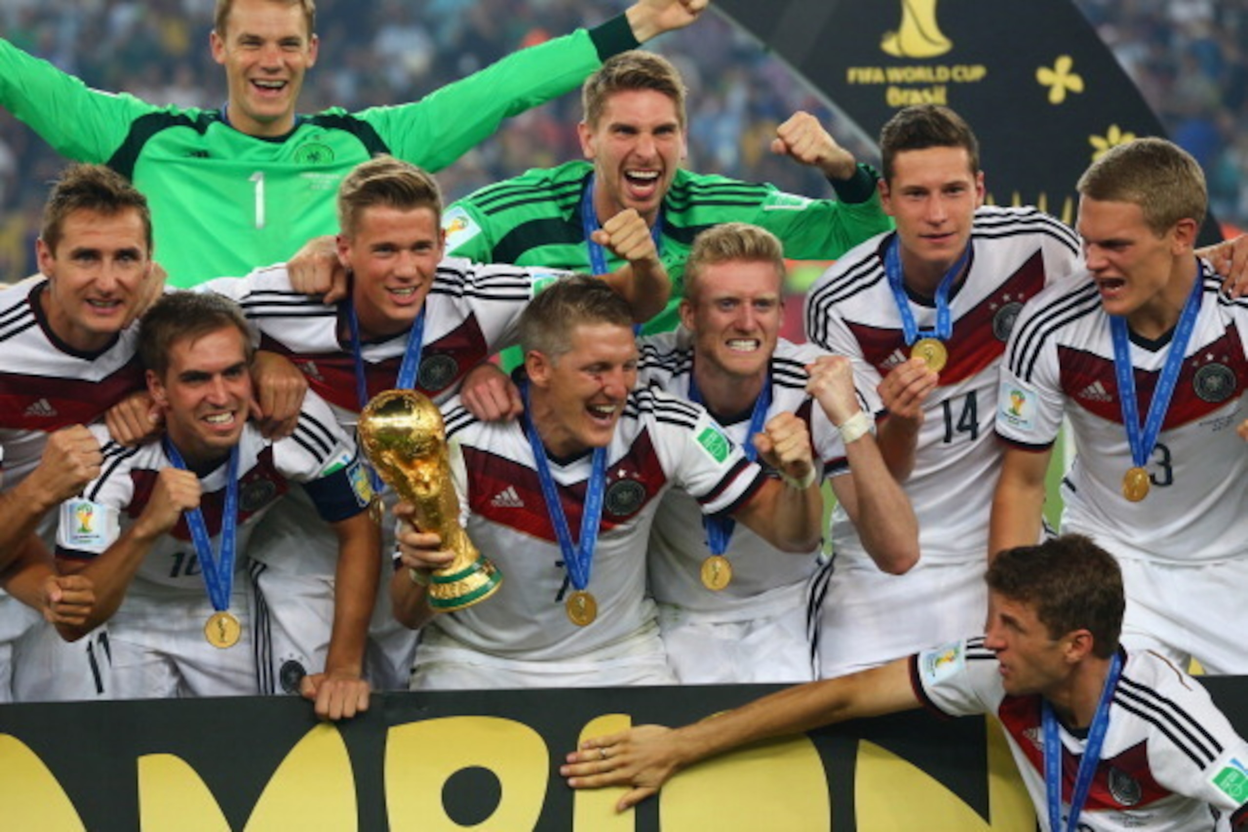 RIO DE JANEIRO, BRAZIL - JULY 13:  Germany celebrate with the World Cup trophy  after defeating Argentina 1-0 in extra time during the 2014 FIFA World Cup Brazil Final match between Germany and Argentina at Maracana on July 13, 2014 in Rio de Janeiro, Bra
