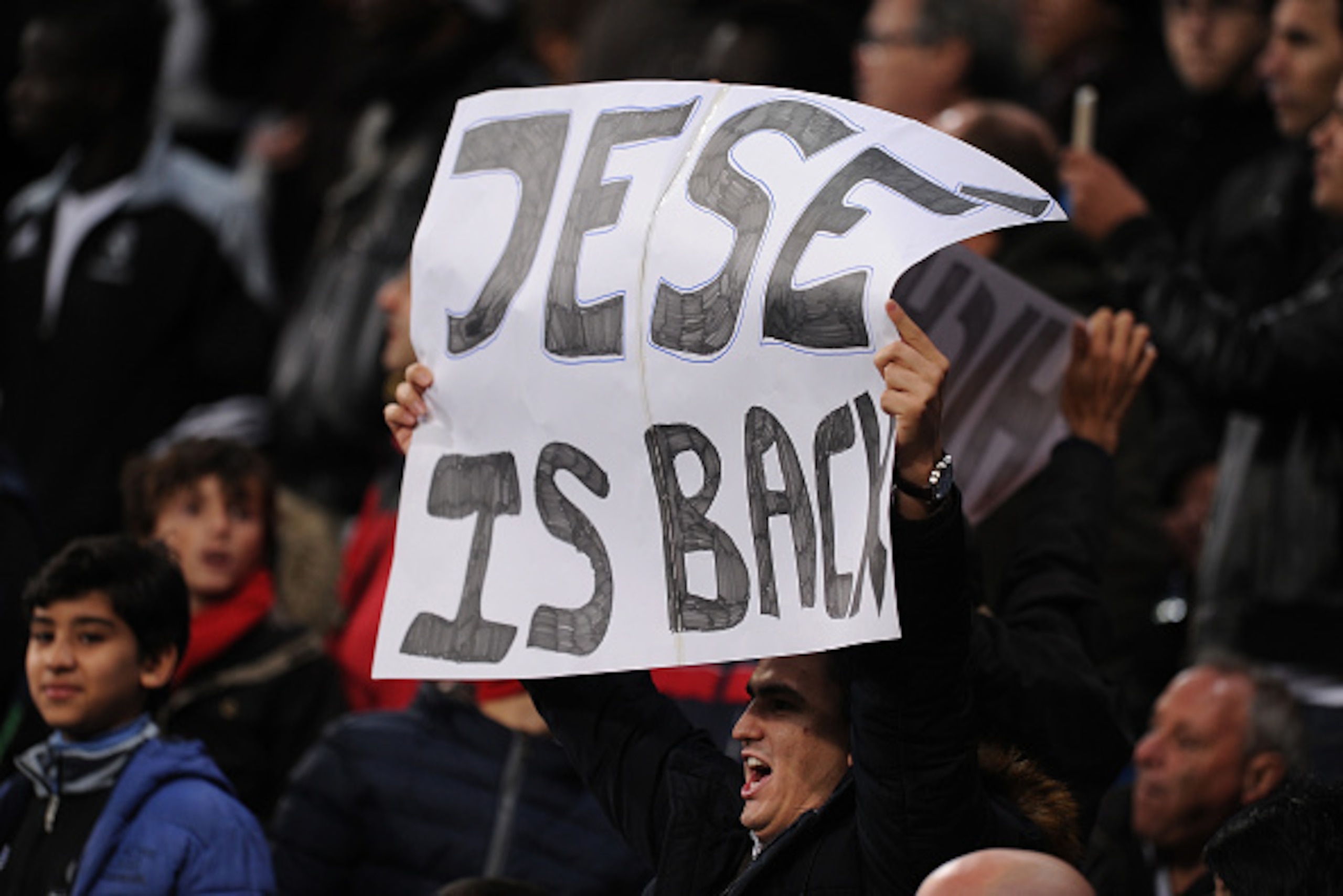 MADRID, SPAIN - DECEMBER 02:  A Real fan hold up a sign while Jese Rodriguez of Real Madrid comes on as a substitute after a long injury during the Copa Del Rey Round of 32, Second Leg match between Real Madrid CF and Cornella at Santiago Bernabeu stadium