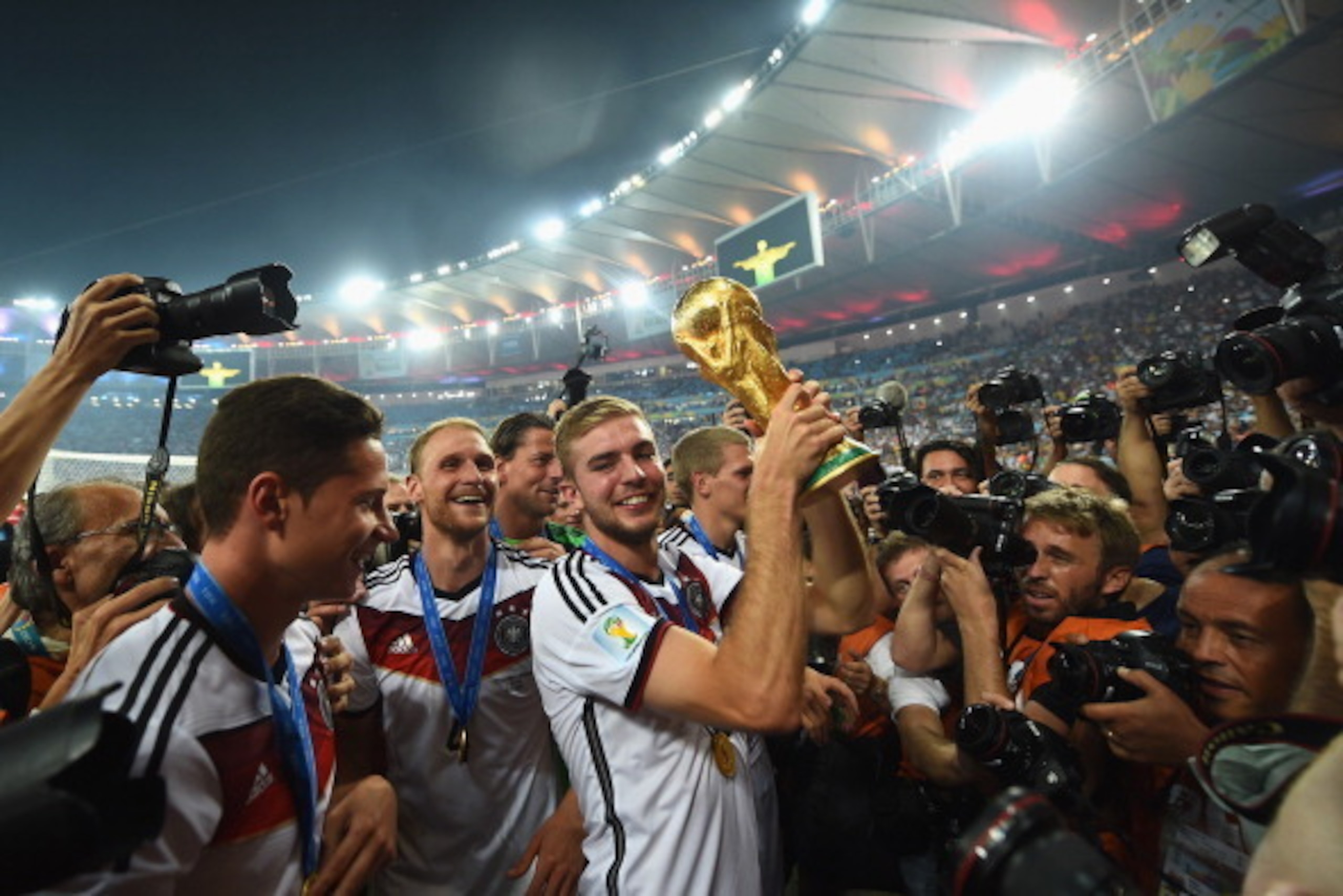 RIO DE JANEIRO, BRAZIL - JULY 13: Christoph Kramer of Germany celebrates with the World Cup trophy after defeating Argentina 1-0 in extra time during the 2014 FIFA World Cup Brazil Final match between Germany and Argentina at Maracana on July 13, 2014 i RIO DE JANEIRO, BRAZIL - JULY 13: Christoph Kramer of Germany celebrates with the World Cup trophy after defeating Argentina 1-0 in extra time during the 2014 FIFA World Cup Brazil Final match between Germany and Argentina at Maracana on July 13, 2014 i