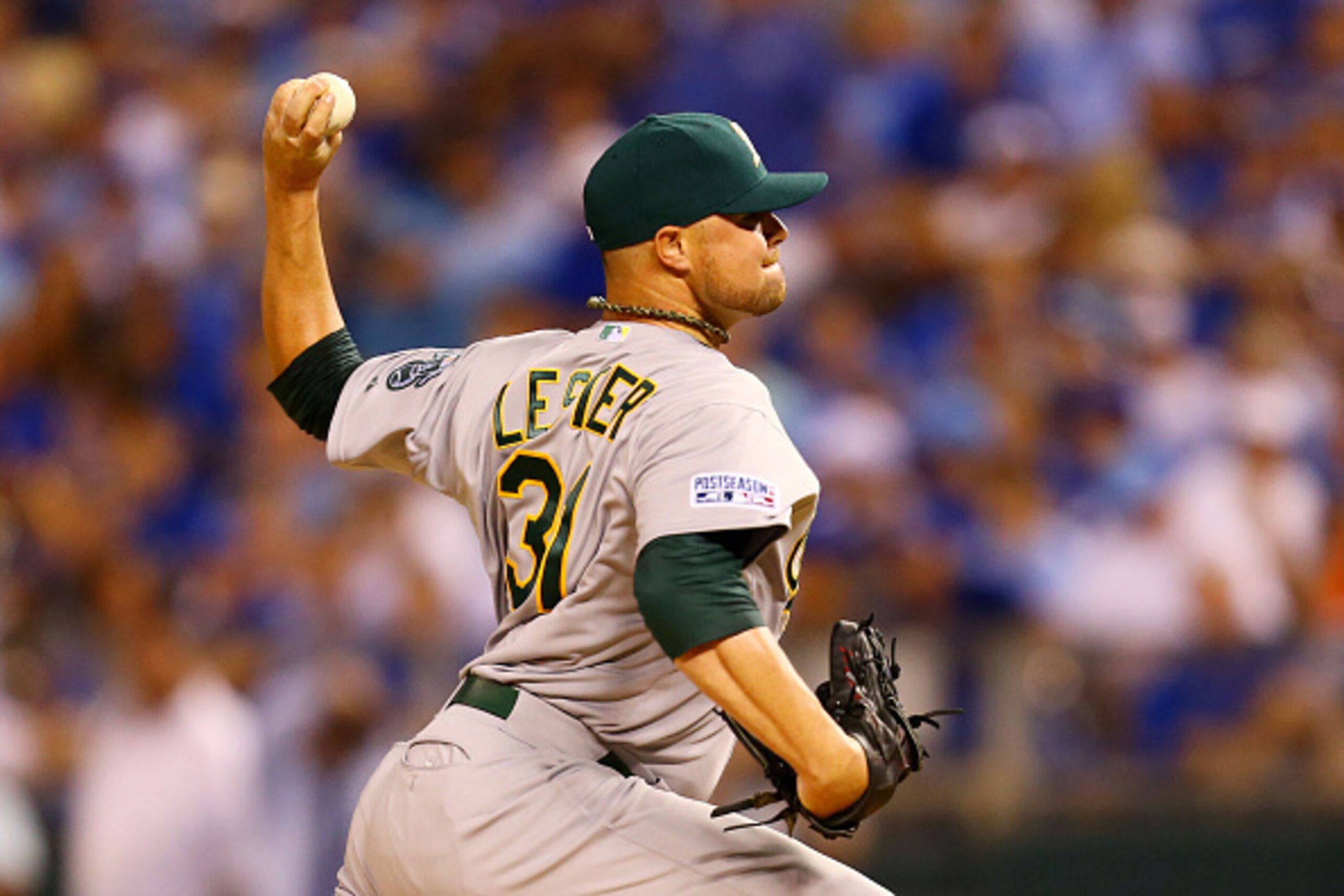 KANSAS CITY, MO - SEPTEMBER 30:  Jon Lester #31 of the Oakland Athletics pitches in the in the first inning against the Kansas City Royals during the American League Wild Card game at Kauffman Stadium on September 30, 2014 in Kansas City, Missouri.  (Phot