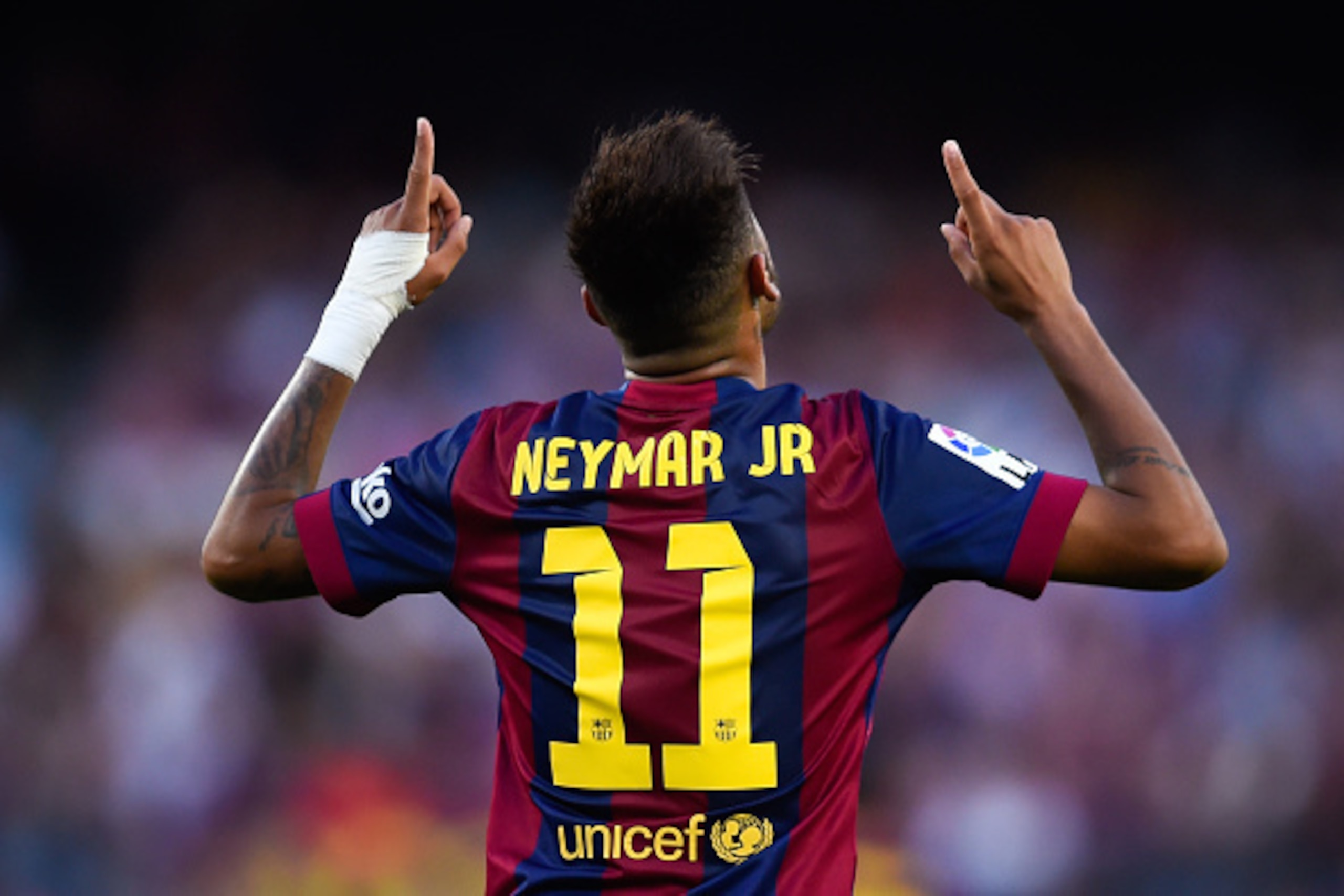 BARCELONA, SPAIN - SEPTEMBER 27:  Neymar of FC Barcelona celebrates after scoring his team's fifth goal during the La Liga match between FC Barcelona and Granada CF at Camp Nou on September 27, 2014 in Barcelona, Spain.  (Photo by David Ramos/Getty Images