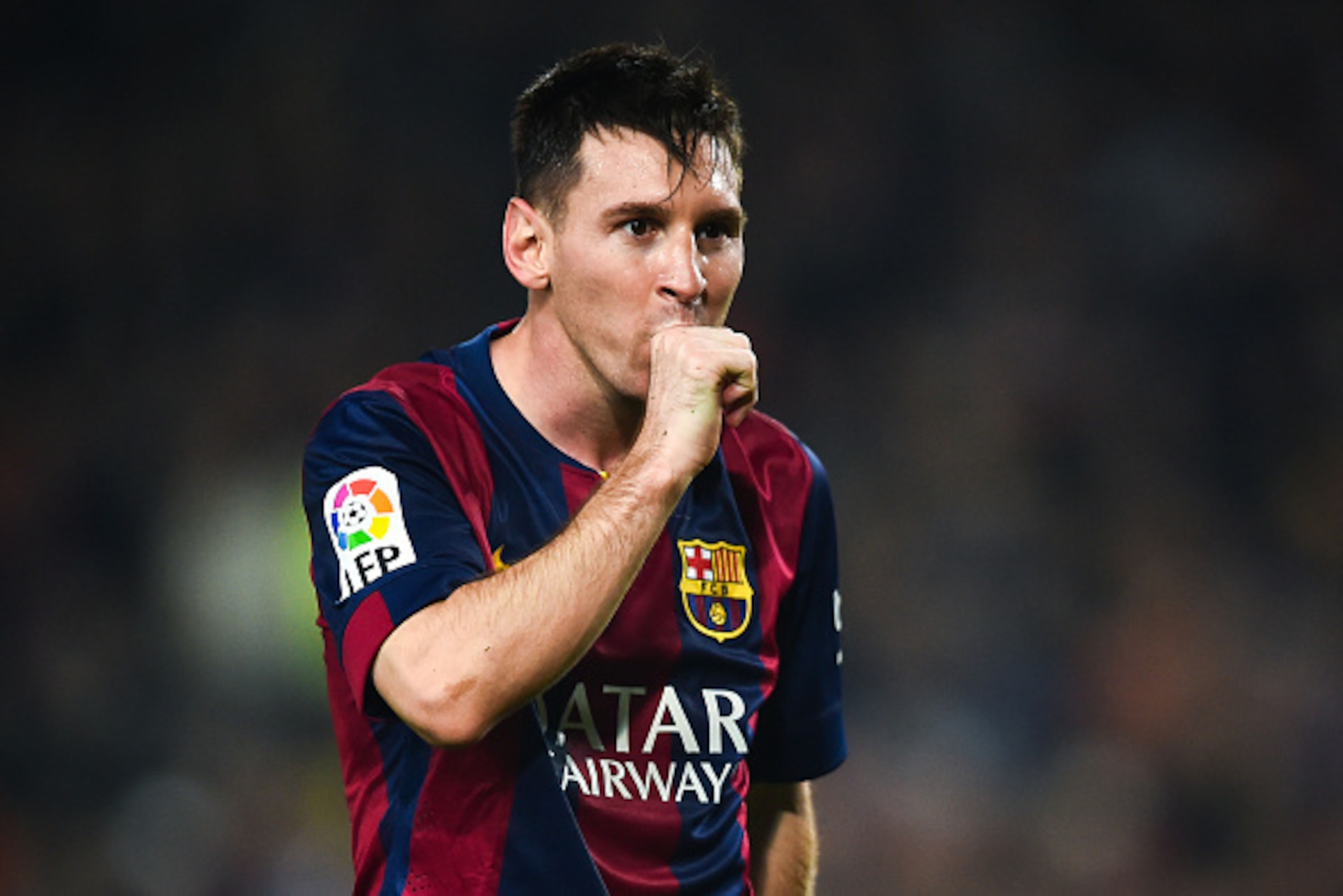 BARCELONA, SPAIN - NOVEMBER 22:  Lionel Messi of FC Barcelona celebrates  after scoring his team's fourth goal during the La Liga match between FC Barcelona and Sevilla FC at Camp Nou on November 22, 2014 in Barcelona, Spain. Lionel Messi beat the record 
