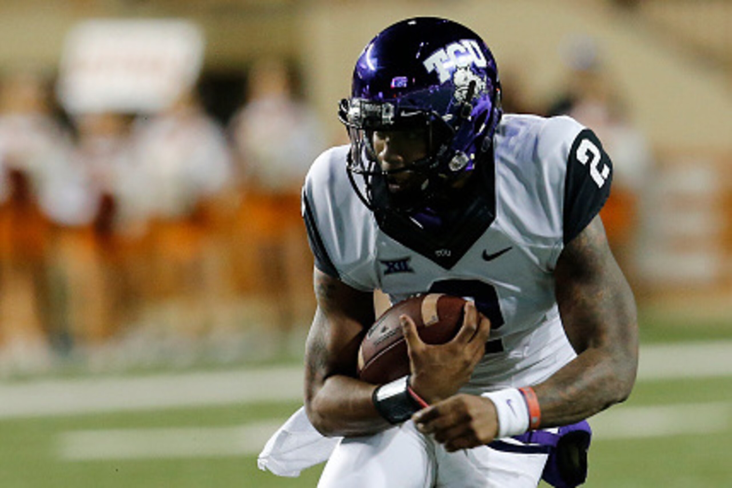 AUSTIN, TX - NOVEMBER 27: Trevone Boykin #2 of the TCU Horned Frogs runs with the ball against the Texas Longhorns at the Darrell K Royal -Texas Memorial Stadium on November 27, 2014 in Austin. Texas. (Photo by Chris Covatta/Getty Images)