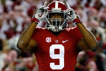 TUSCALOOSA, AL - NOVEMBER 29:  Amari Cooper #9 of the Alabama Crimson Tide celebrates after catching a 39 yard touchdown pass thrown by Blake Sims #6 in the third quarter against the Auburn Tigers during the Iron Bowl at Bryant-Denny Stadium on November 2