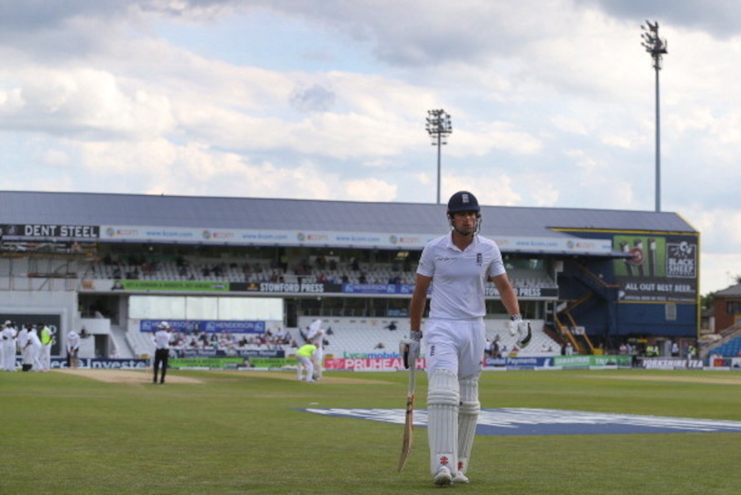 LEEDS, ENGLAND - JUNE 23: England captain Alastair Cook makes his way back to the pavilion after he was bowled out by Dhammika Prasad of Sri Lanka during day four of the 2nd Investec Test match between England and Sri Lanka at Headingley Cricket Ground on