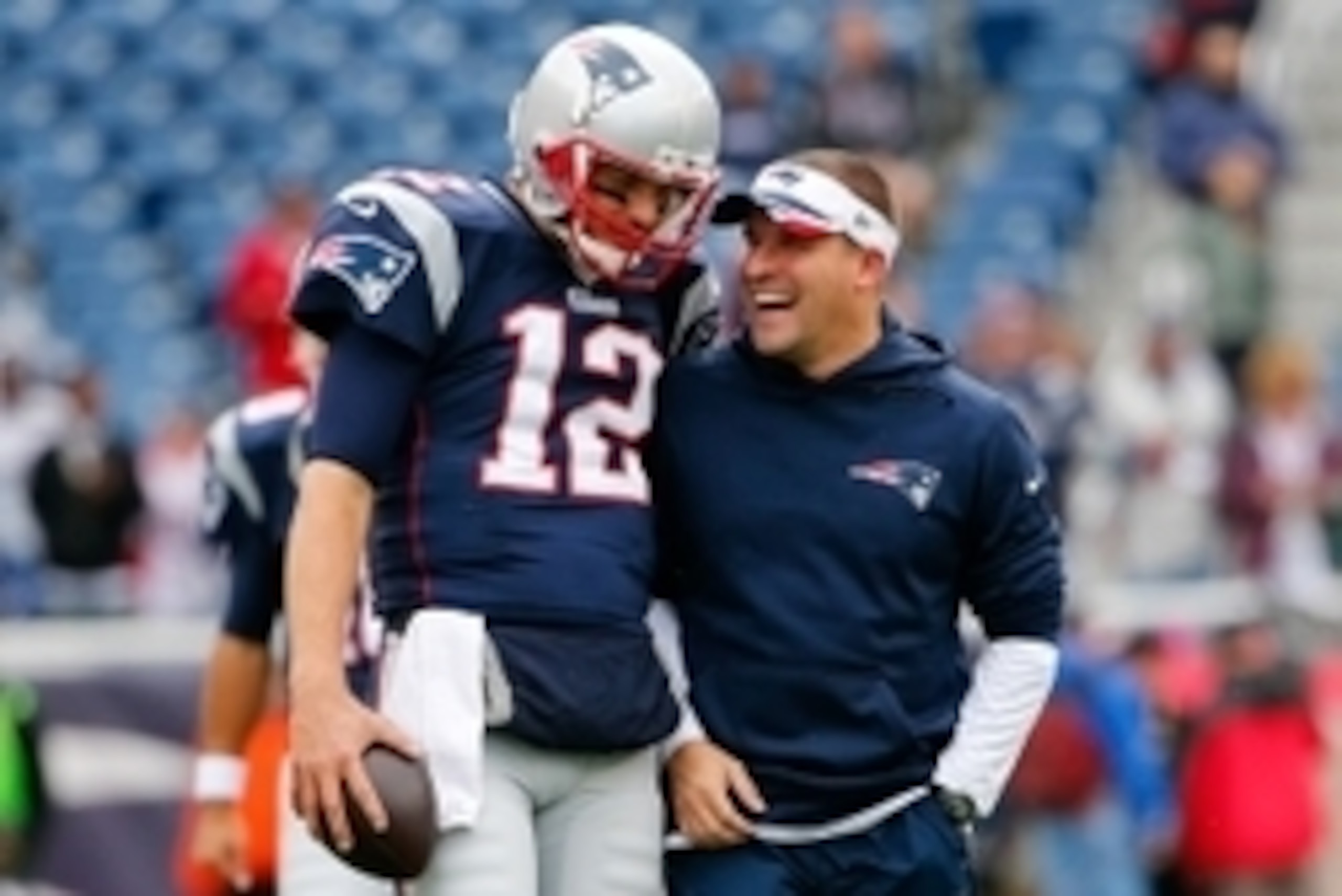 Oct 26, 2014; Foxborough, MA, USA; New England Patriots quarterback Tom Brady has a laugh with offensive coordinator Josh McDaniels before the game between the New England Patriots and the Chicago Bears at Gillette Stadium. Mandatory Credit: Winslow Towns Oct 26, 2014; Foxborough, MA, USA; New England Patriots quarterback Tom Brady has a laugh with offensive coordinator Josh McDaniels before the game between the New England Patriots and the Chicago Bears at Gillette Stadium. Mandatory Credit: Winslow Towns
