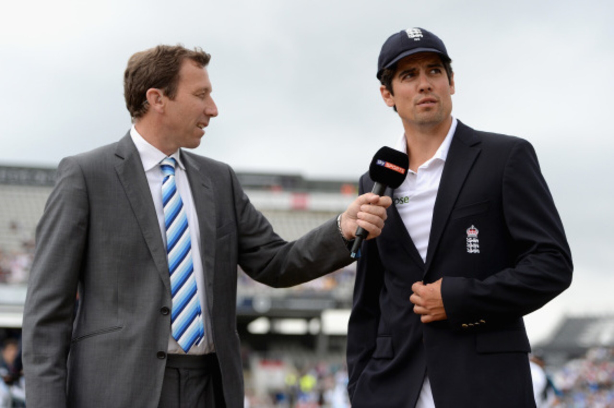 MANCHESTER, ENGLAND - AUGUST 07:  England captain Alastair Cook speaks with Sky Sports commentator Michael Atherton ahead of day one of 4th Investec Test match between England and India at Old Trafford on August 7, 2014 in Manchester, England.  (Photo by 