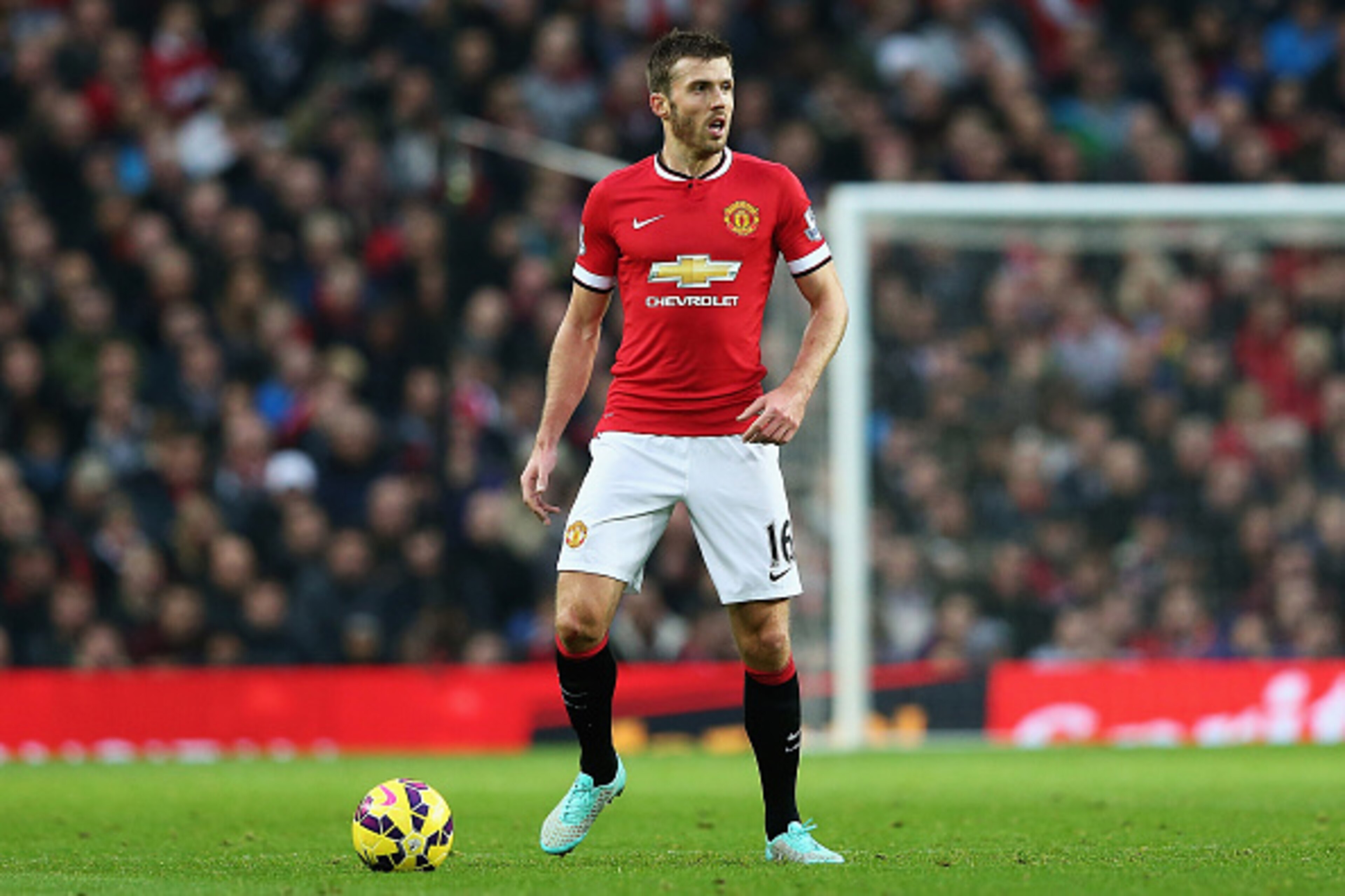 MANCHESTER, ENGLAND - NOVEMBER 29: Michael Carrick of Manchester United in action during the Barclays Premier League match between Manchester United and Hull City at Old Trafford on November 29, 2014 in Manchester, England. (Photo by Matthew Lewis/Getty MANCHESTER, ENGLAND - NOVEMBER 29: Michael Carrick of Manchester United in action during the Barclays Premier League match between Manchester United and Hull City at Old Trafford on November 29, 2014 in Manchester, England. (Photo by Matthew Lewis/Getty
