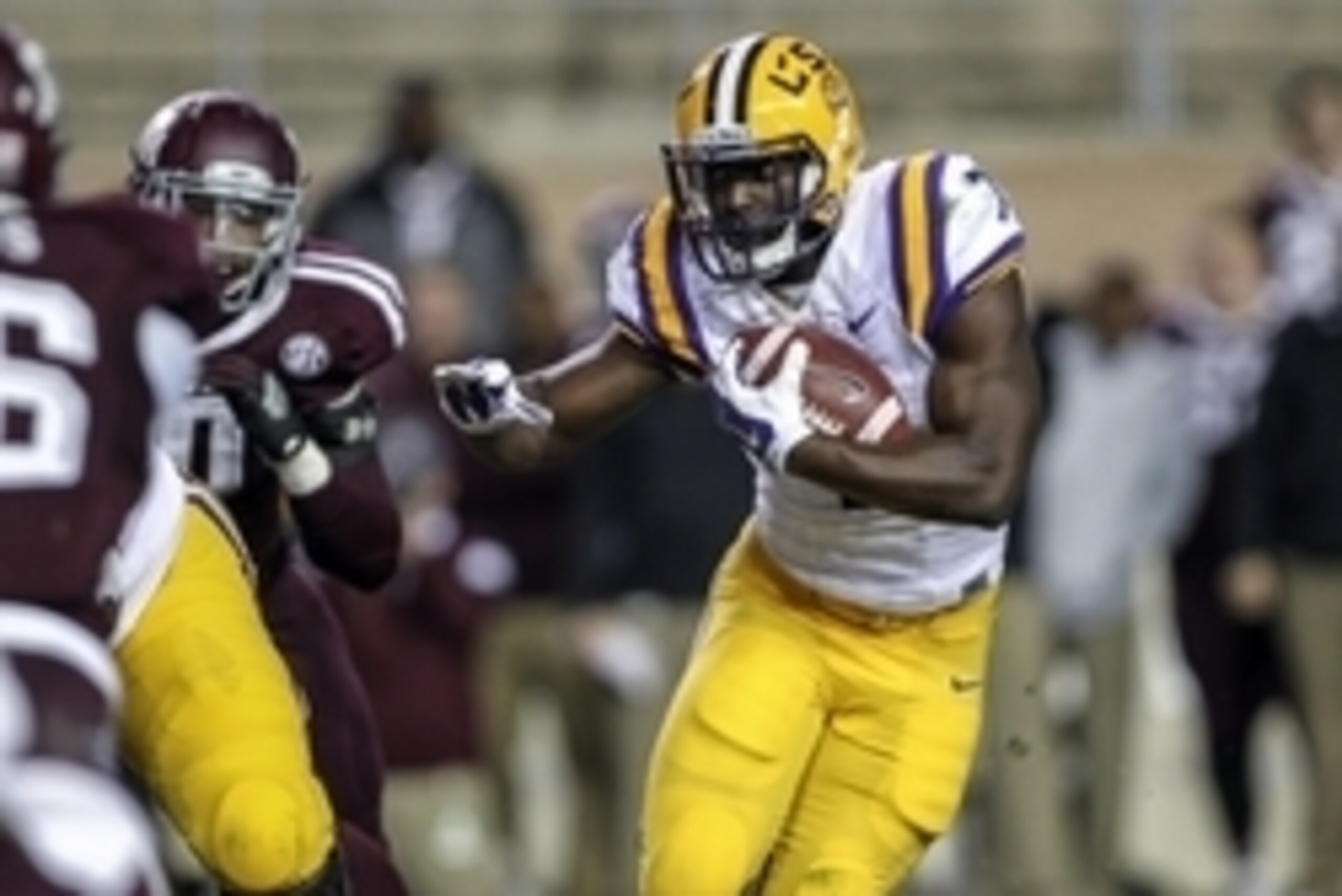 Nov 27, 2014; College Station, TX, USA; LSU Tigers running back Leonard Fournette (7) rushes during the second quarter against the Texas A&M Aggies at Kyle Field. Mandatory Credit: Troy Taormina-USA TODAY Sports