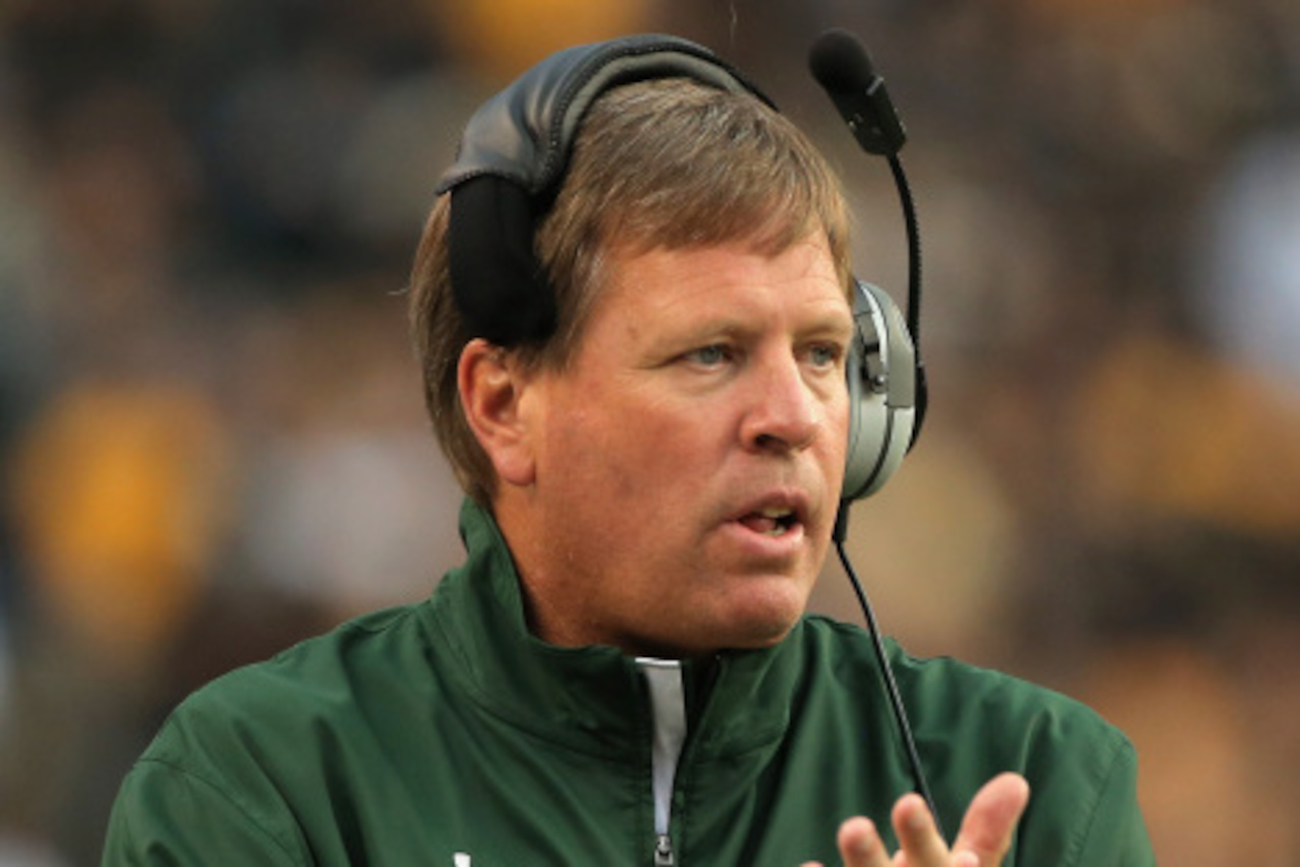 DENVER, CO - AUGUST 29:  Head coach Jim McElwain of the Colorado State Rams  leads his team against the Colorado Buffaloes in the Rocky Mountain Showdown at Sports Authority Field at Mile High on August 29, 2014 in Denver, Colorado. The Colorado State Ram