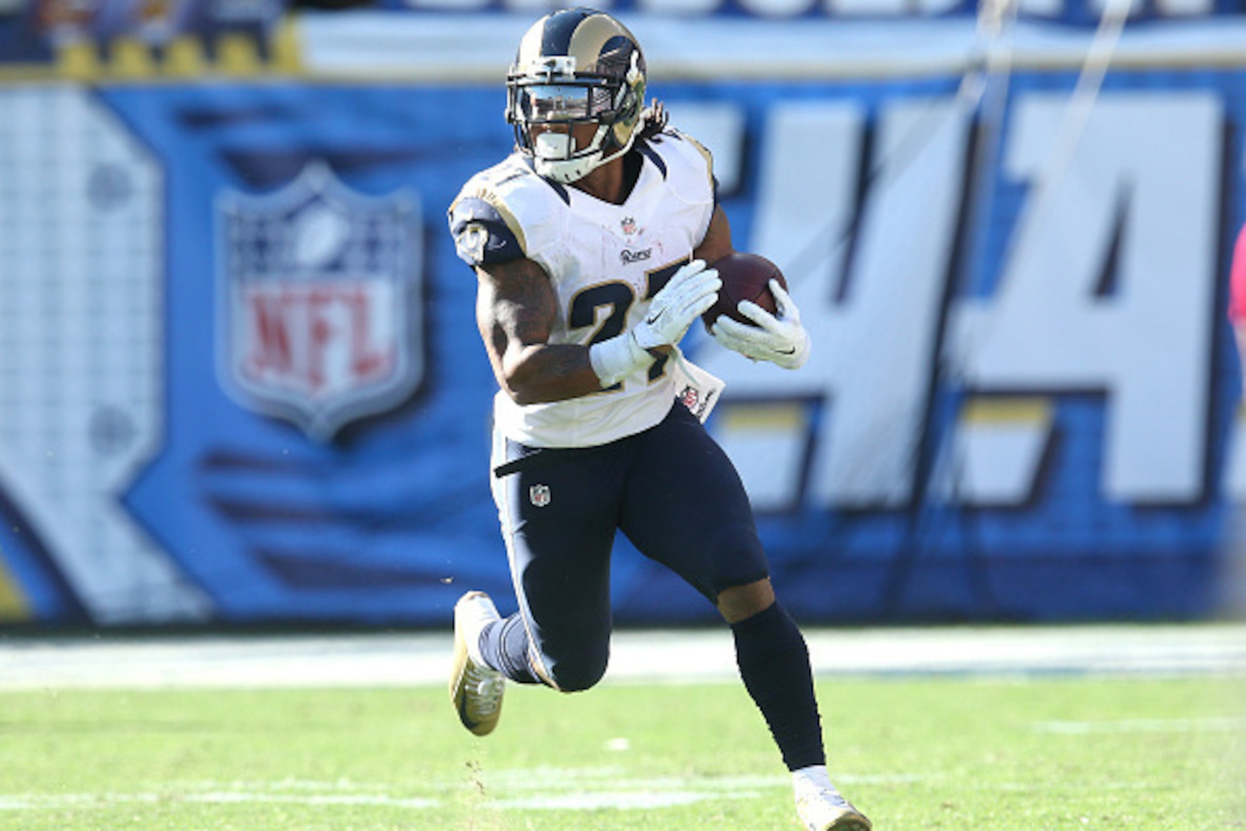 SAN DIEGO, CA - NOVEMBER 23:  Running back Tre Mason #27 of the St. Louis Rams carries the ball against the San Diego Chargers at Qualcomm Stadium on November 23, 2014 in San Diego, California.  (Photo by Stephen Dunn/Getty Images)