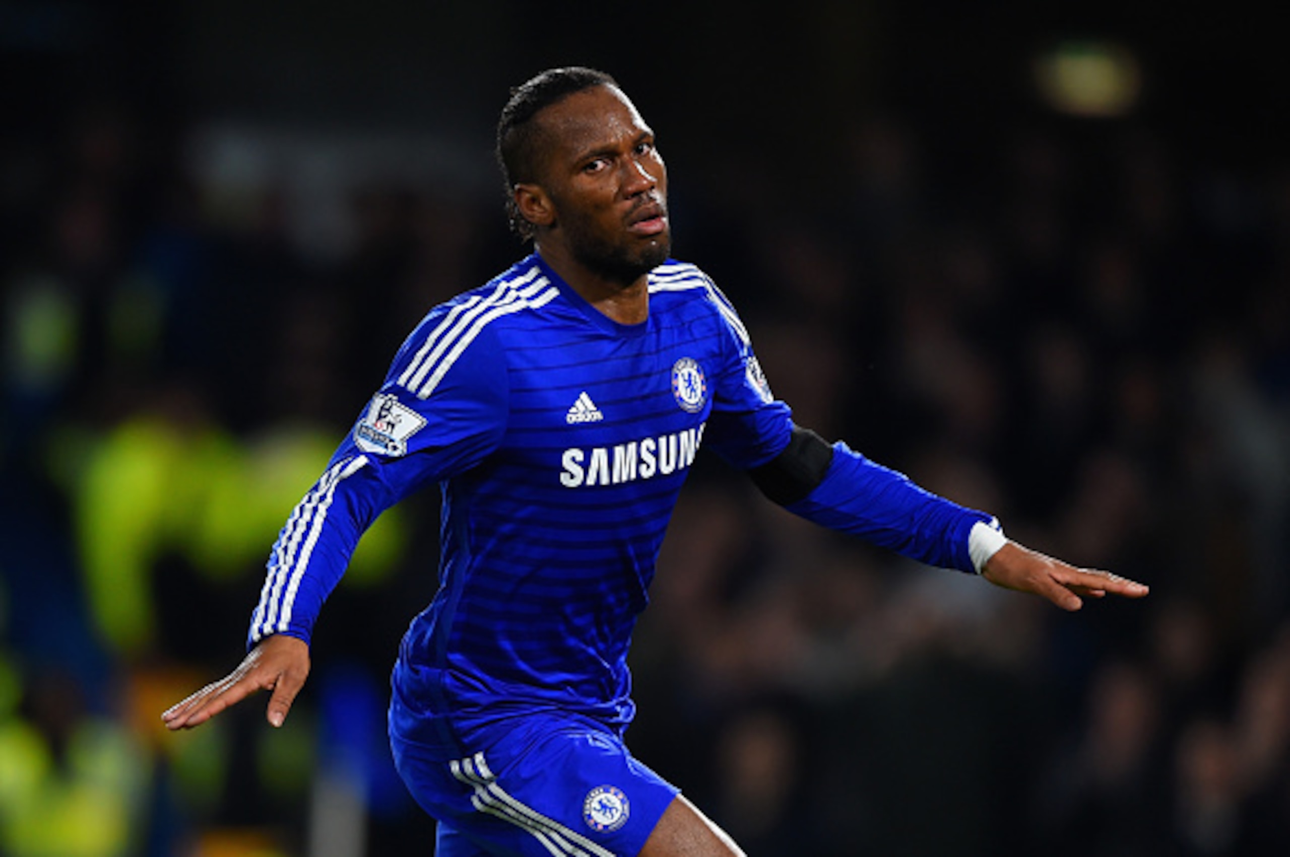 LONDON, ENGLAND - DECEMBER 03:  Didier Drogba of Chelsea celebrates scoring their second goal  during the Barclays Premier League match between Chelsea and Tottenham Hotspur at Stamford Bridge on December 3, 2014 in London, England.  (Photo by Shaun Botte