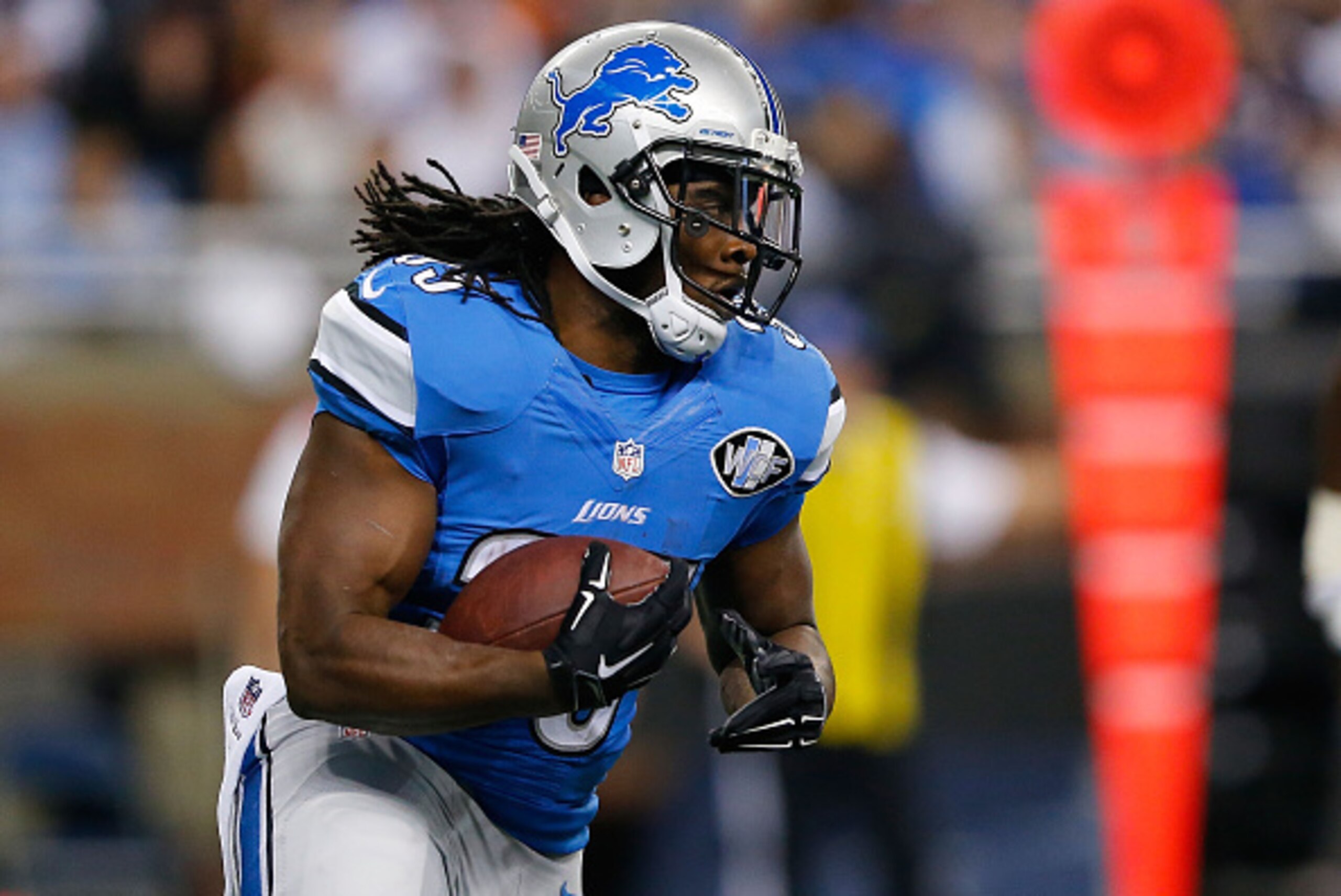 DETROIT, MI - NOVEMBER 27:  Joique Bell #35 of the Detroit Lions runs for a first down during the third quarter of the game against the Chicago Bears at Ford Field on November 27, 2014 in Detroit, Michigan. The Lions defeated the Bears 34-17.  (Photo by L