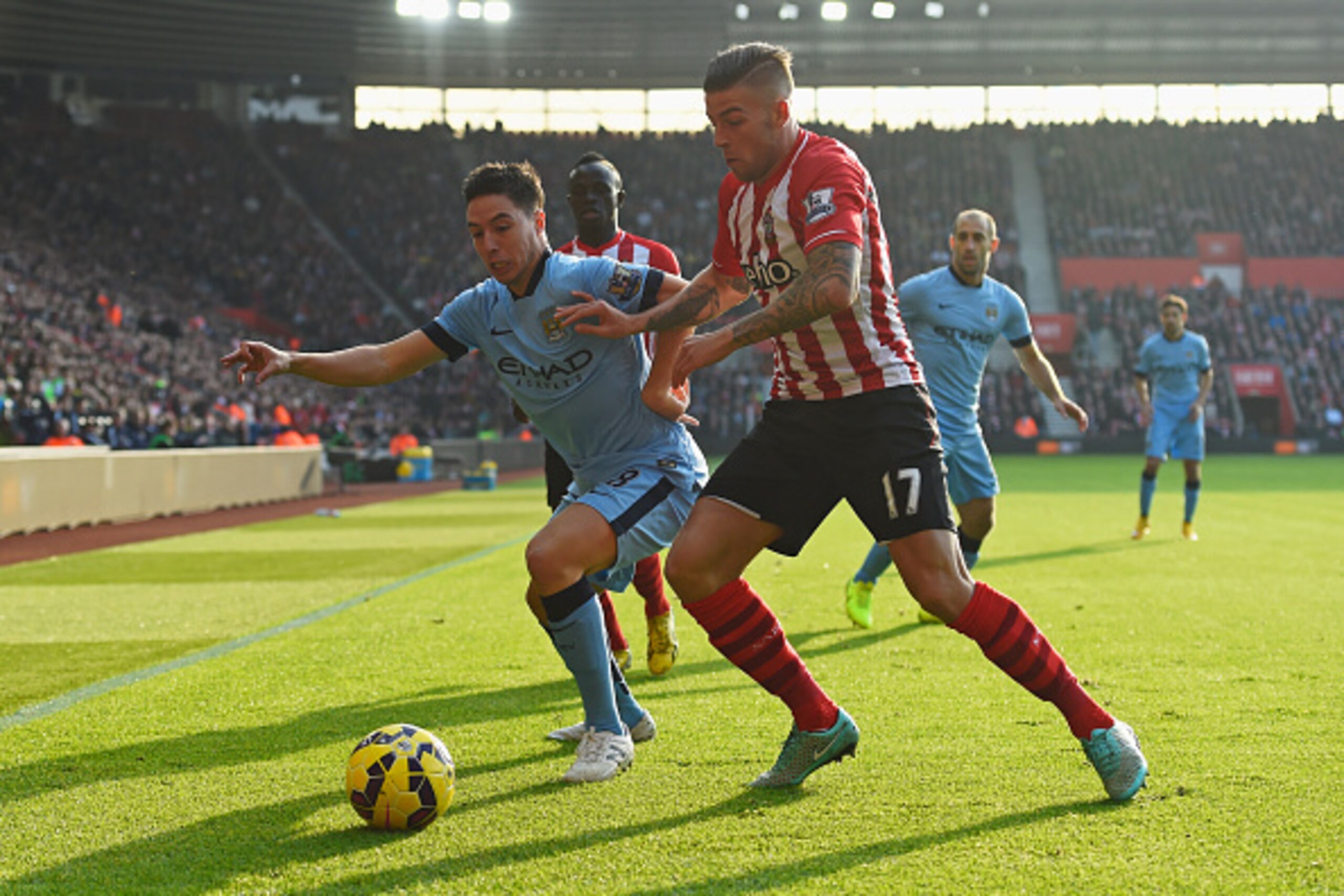 SOUTHAMPTON, ENGLAND - NOVEMBER 30: Samir Nasri of Manchester City holds off Toby Alderweireld of Southampton during the Barclays Premier League match between Southampton and Manchester City at St Mary's Stadium on November 30, 2014 in Southampton, Engla SOUTHAMPTON, ENGLAND - NOVEMBER 30: Samir Nasri of Manchester City holds off Toby Alderweireld of Southampton during the Barclays Premier League match between Southampton and Manchester City at St Mary's Stadium on November 30, 2014 in Southampton, Engla