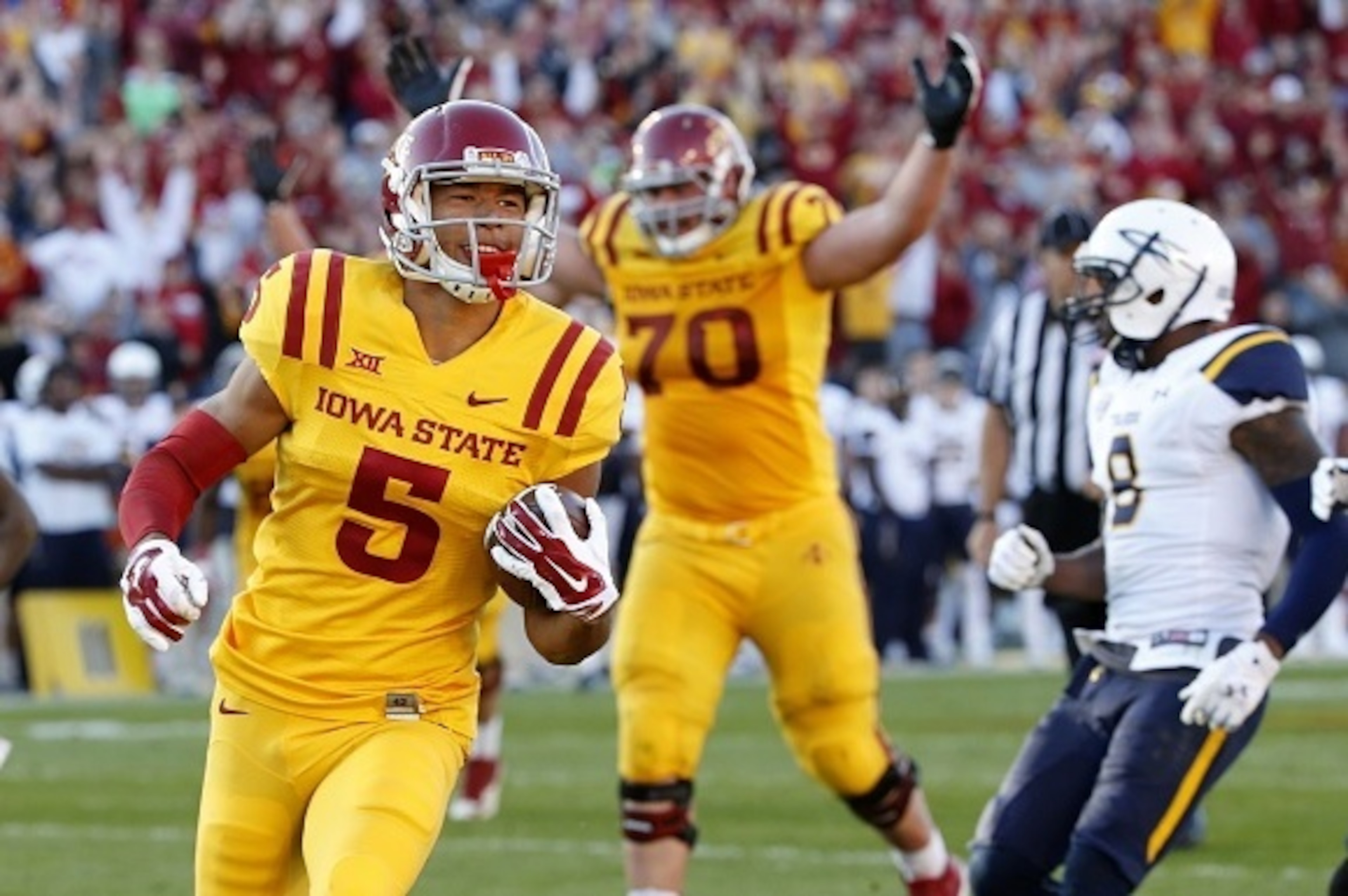AMES, IA - OCTOBER 11: Wide receiver Allen Lazard #5 of the Iowa State Cyclones scores a touchdown in the second half of play against the Toledo Rockets at Jack Trice Stadium on October 11, 2014 in Ames, Iowa. Iowa State defeated Toledo 37-30. (Photo by D AMES, IA - OCTOBER 11: Wide receiver Allen Lazard #5 of the Iowa State Cyclones scores a touchdown in the second half of play against the Toledo Rockets at Jack Trice Stadium on October 11, 2014 in Ames, Iowa. Iowa State defeated Toledo 37-30. (Photo by D