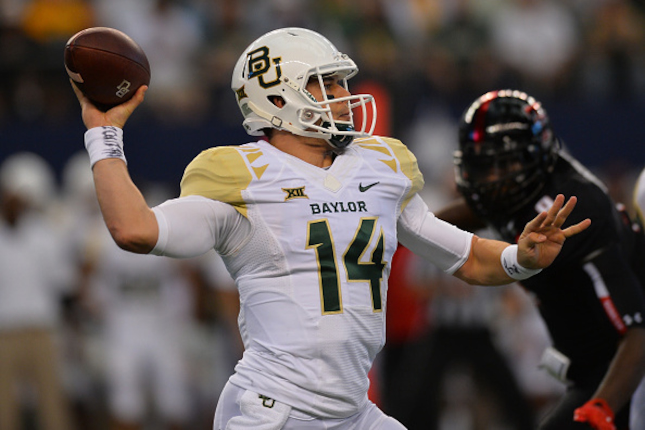 ARLINGTON, TX - NOVEMBER 29: Bryce Petty #14 of the Baylor Bears during the first half against the Texas Tech Red Raiders on November 29, 2014 at AT&T Stadium in Arlington, Texas. (Photo by John Weast/Getty Images)