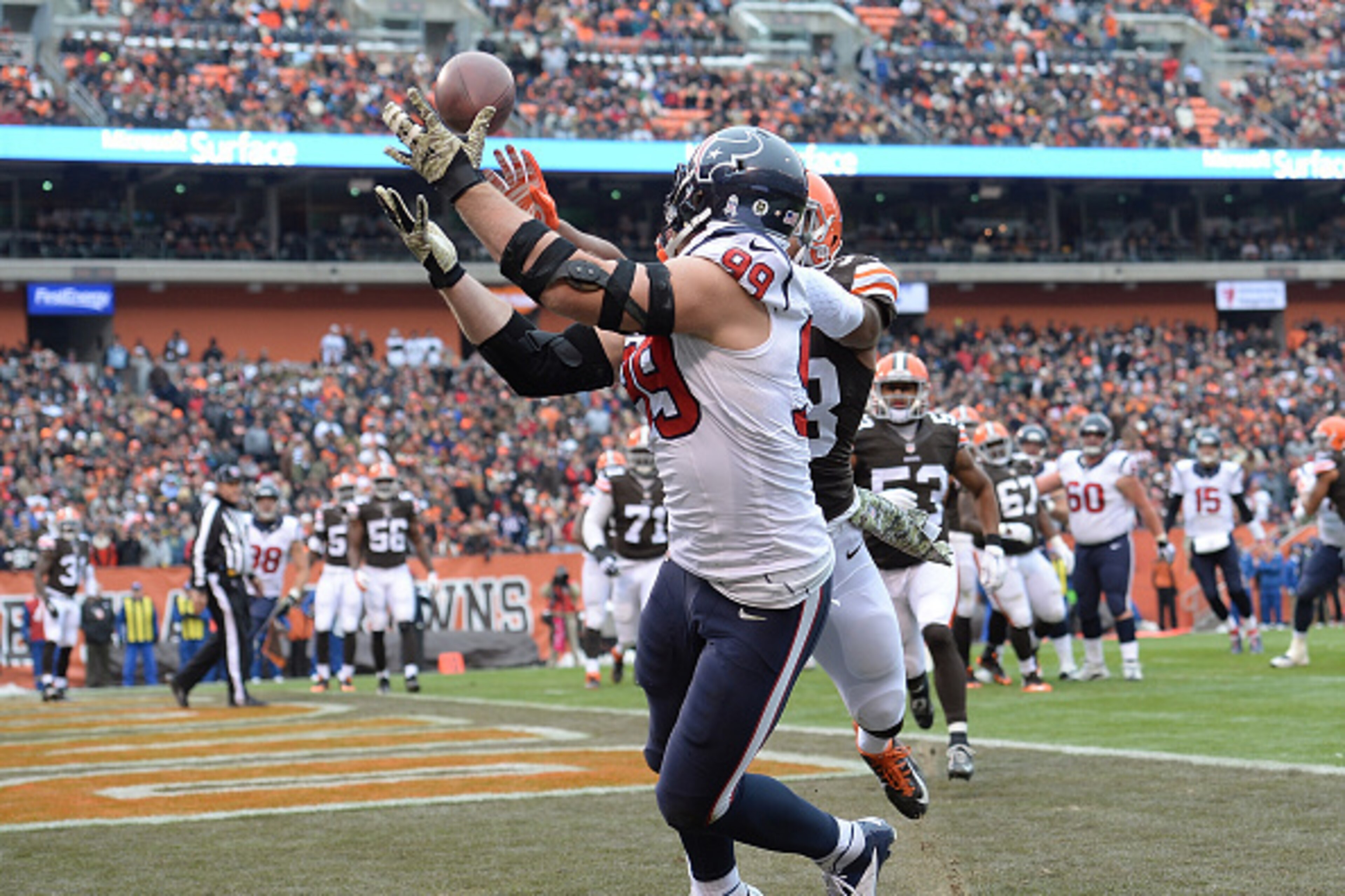 CLEVELAND, OH - NOVEMBER 16: J.J. Watt #99 of the Houston Texans makes a touchdown catch in front of Chris Kirksey #58 of the Cleveland Browns during the first quarter at FirstEnergy Stadium on November 16, 2014 in Cleveland, Ohio. (Photo by Jason Mille CLEVELAND, OH - NOVEMBER 16: J.J. Watt #99 of the Houston Texans makes a touchdown catch in front of Chris Kirksey #58 of the Cleveland Browns during the first quarter at FirstEnergy Stadium on November 16, 2014 in Cleveland, Ohio. (Photo by Jason Mille
