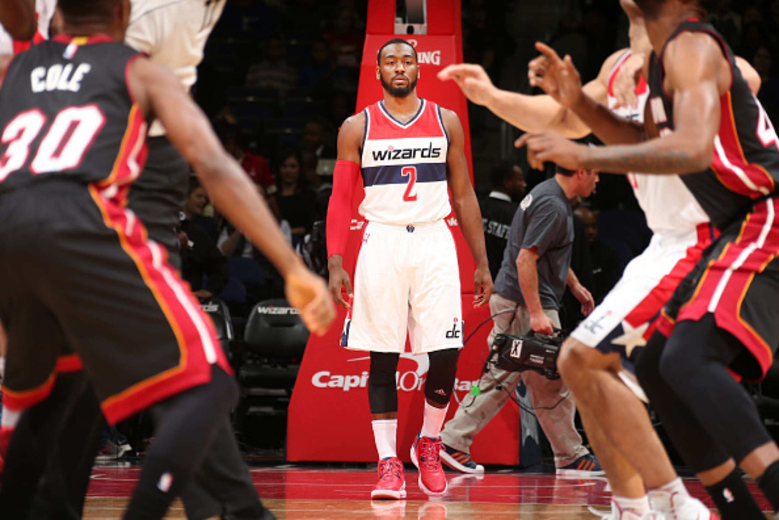 WASHINGTON,DC - December 1: John Wall #2 of the Washington Wizards during the game against the Miami Heat on December 1, 2014 at Verizon Center in Washington, DC. NOTE TO USER: User expressly acknowledges and agrees that, by downloading and or using this 