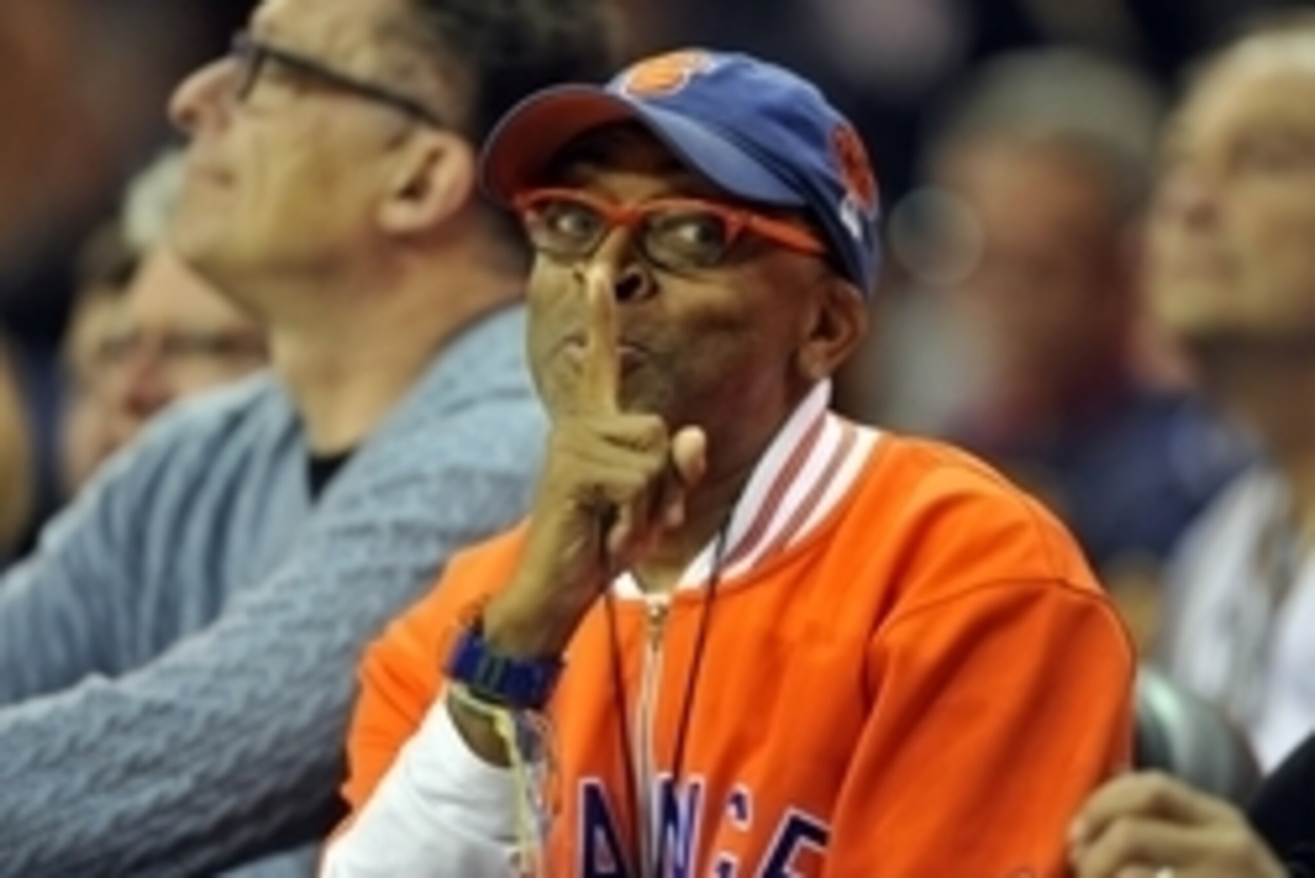Oct 30, 2014; Cleveland, OH, USA;  Actor and director Spike Lee talks to Cleveland Cavaliers fans in the second quarter against the New York Knicks at Quicken Loans Arena. Mandatory Credit: David Richard-USA TODAY Sports