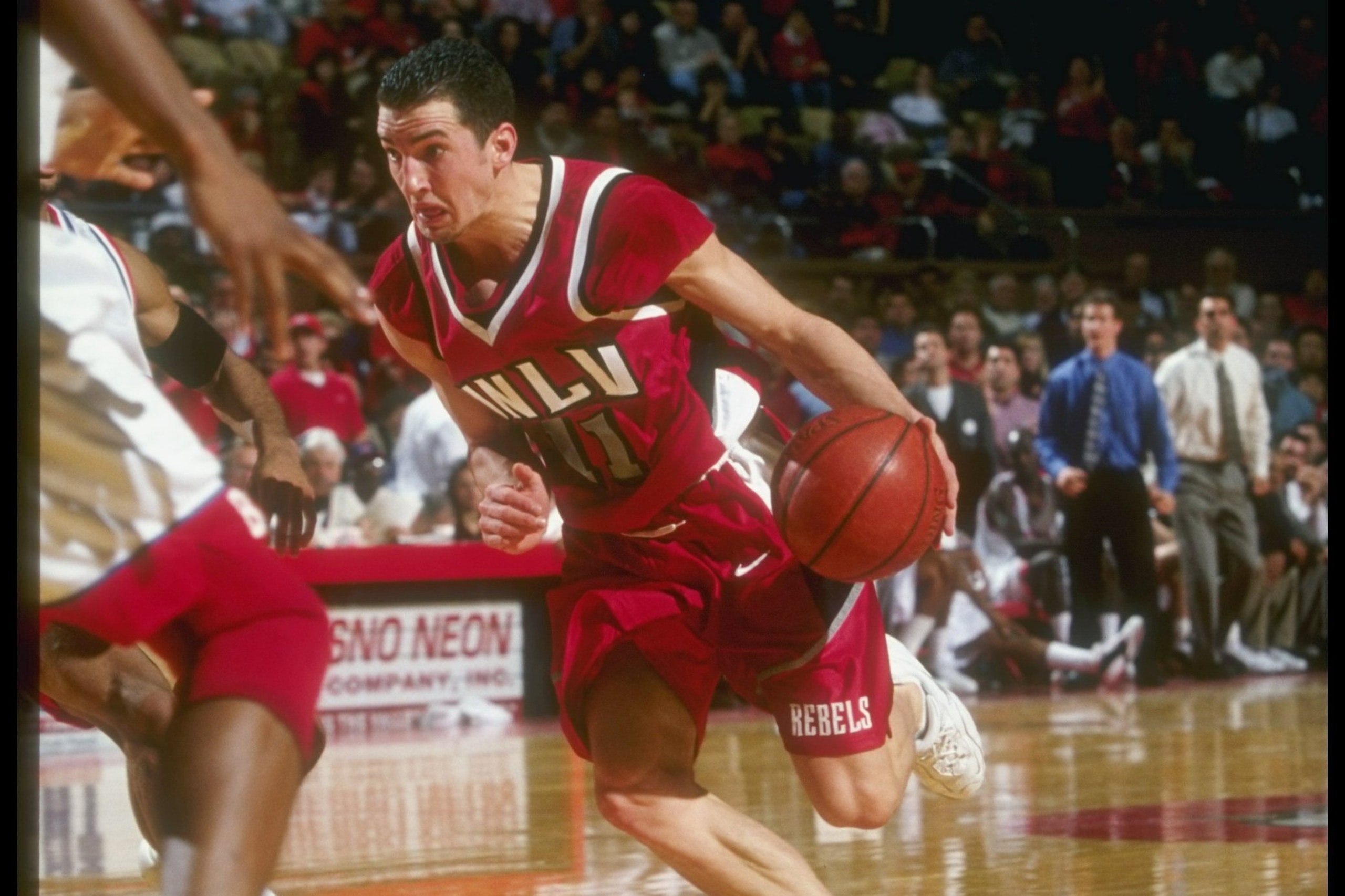 20 Jan 1997:  Guard Mark Dickel of the UNLV Rebels moves the ball during a game against the Fresno State Bulldogs at Selland Arena in Fresno, California.  Fresno State won the game, 93-82. Mandatory Credit: Todd Warshaw  /Allsport
