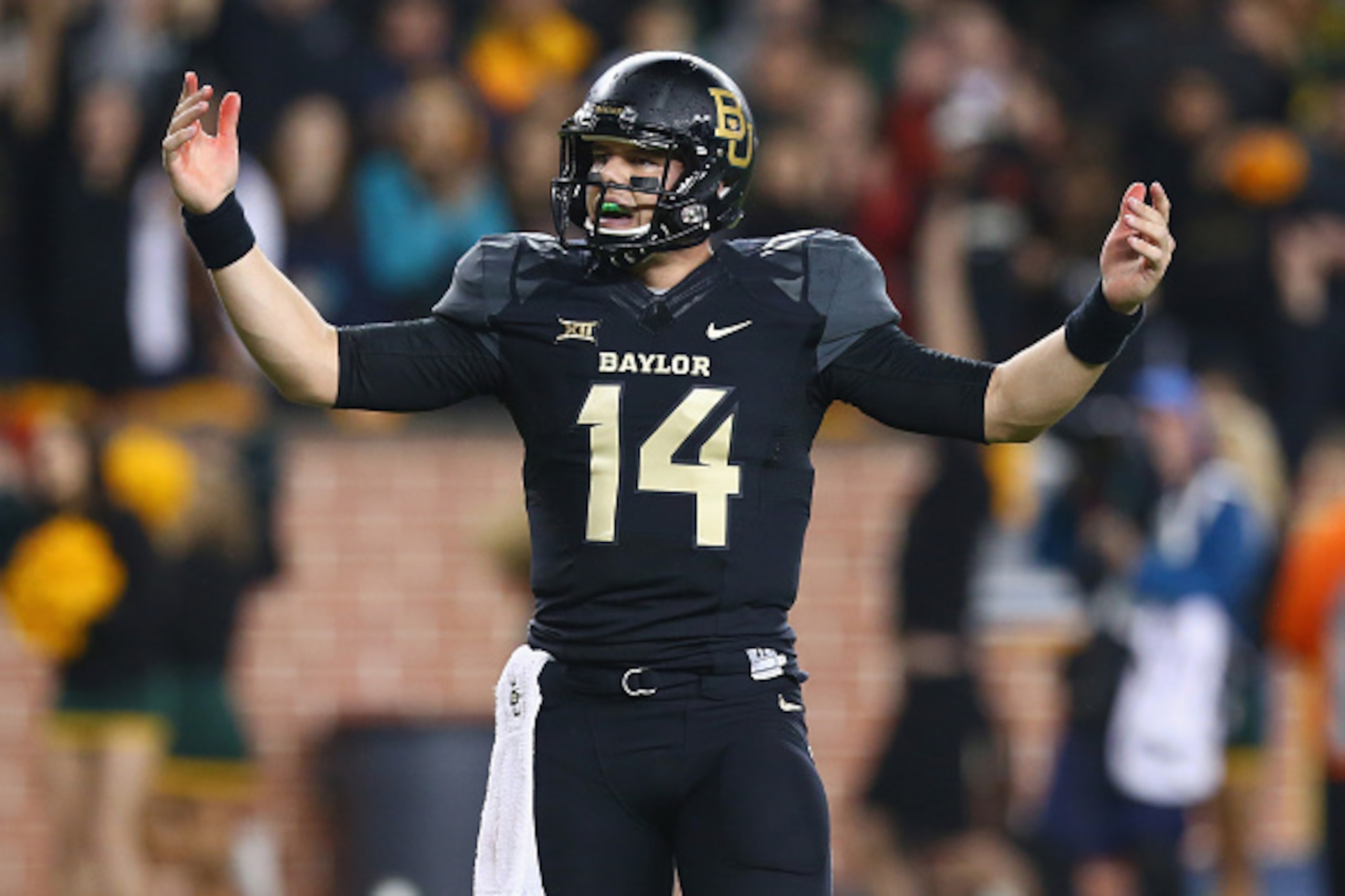 WACO, TX - NOVEMBER 22:  Bryce Petty #14 of the Baylor Bears at McLane Stadium on November 22, 2014 in Waco, Texas.  (Photo by Ronald Martinez/Getty Images)