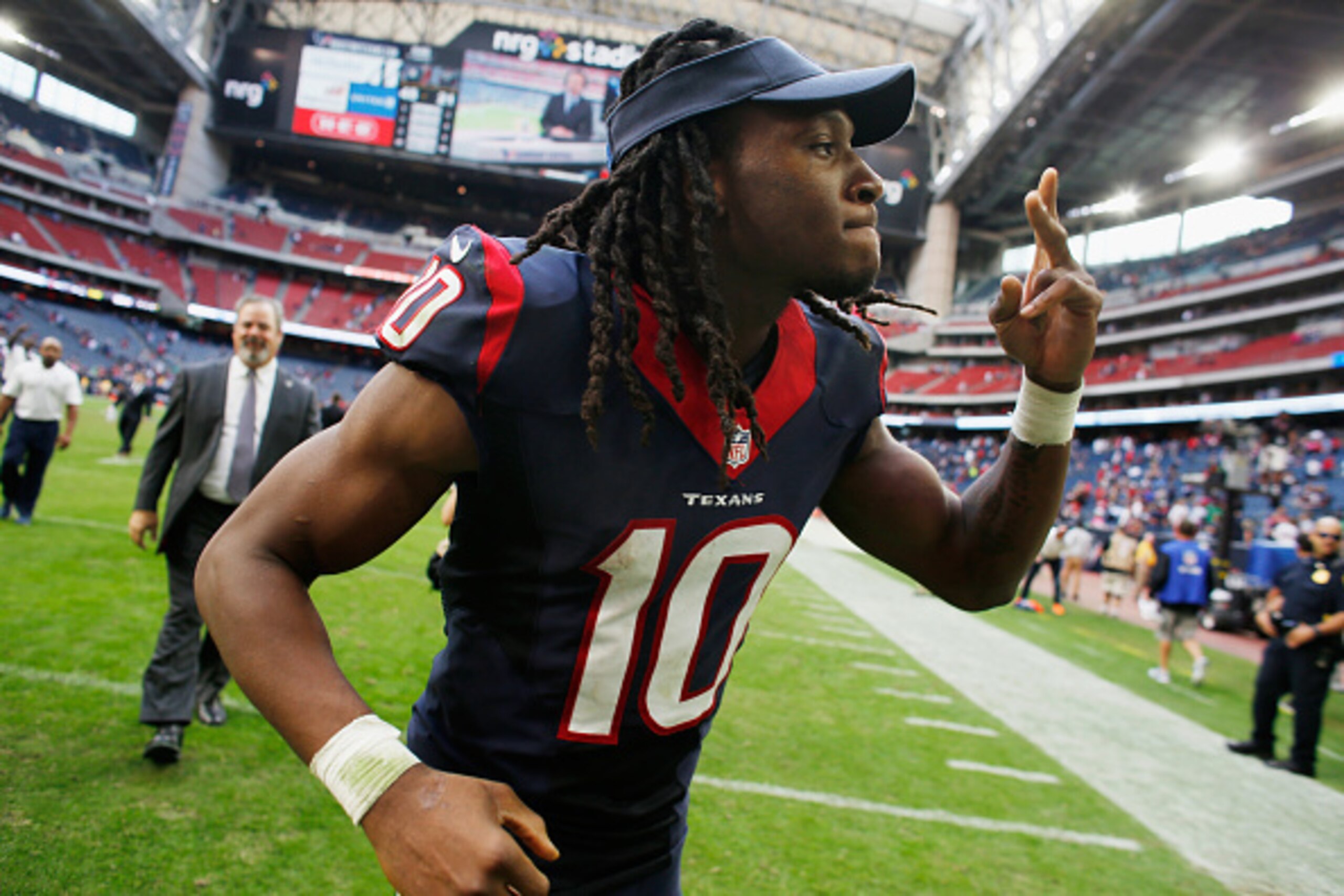 HOUSTON, TX - NOVEMBER 30:  DeAndre Hopkins #10 of the Houston Texans walks off the field afrter the Texans defeated the Tennessee Titans 45-21 at NRG Stadium on November 30, 2014 in Houston, Texas.  (Photo by Scott Halleran/Getty Images)