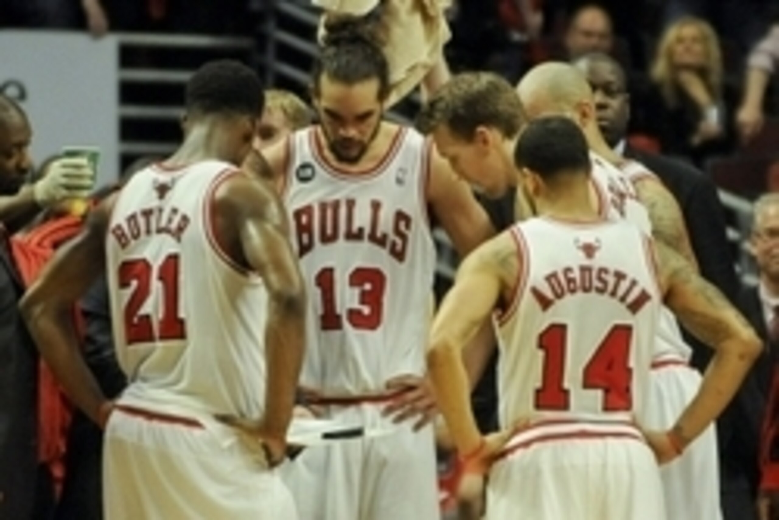 Apr 29, 2014; Chicago, IL, USA Chicago Bulls guard Jimmy Butler (21), center Joakim Noah (13), guard D.J. Augustin (14) and forward Mike Dunleavy (34) huddle against the Washington Wizards in game five in the first round of the 2014 NBA Playoffs at United