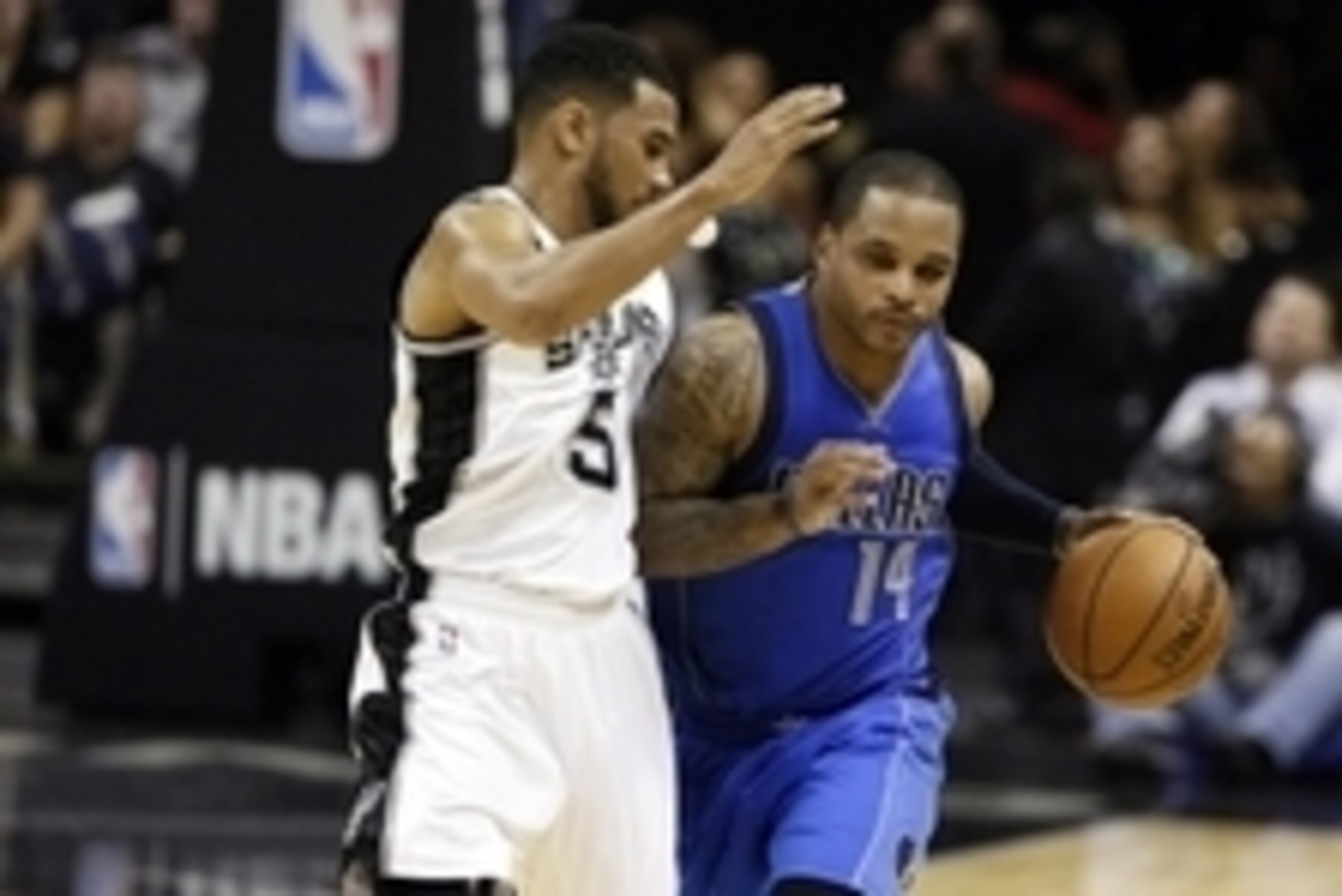 Oct 28, 2014; San Antonio, TX, USA; Dallas Mavericks point guard Jameer Nelson (14) drives against San Antonio Spurs point guard Cory Joseph (5) during the second half at AT&T Center. The Spurs won 101-100. Mandatory Credit: Soobum Im-USA TODAY Sports Oct 28, 2014; San Antonio, TX, USA; Dallas Mavericks point guard Jameer Nelson (14) drives against San Antonio Spurs point guard Cory Joseph (5) during the second half at AT&T Center. The Spurs won 101-100. Mandatory Credit: Soobum Im-USA TODAY Sports