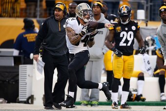 PITTSBURGH, PA - NOVEMBER 30:  Kenny Stills #84 of the New Orleans Saints makes a catch and runs for a touchdown during the third quarter against the Pittsburgh Steelers at Heinz Field on November 30, 2014 in Pittsburgh, Pennsylvania.  (Photo by Gregory S