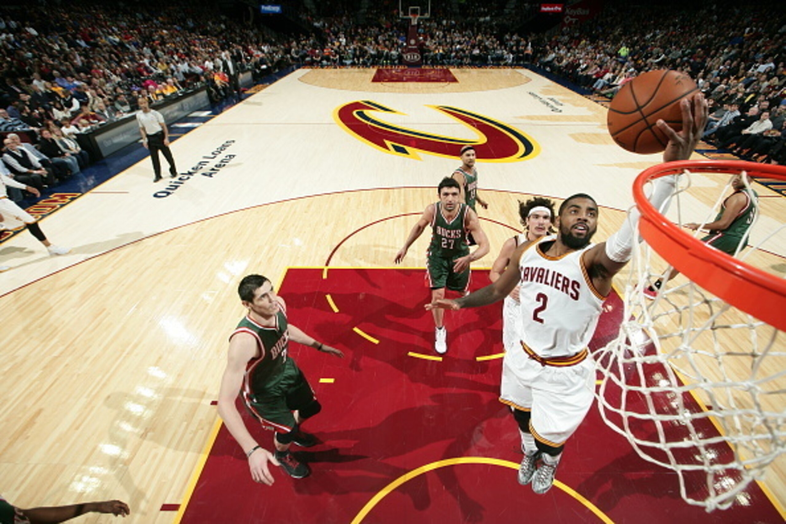 CLEVELAND, OH - DECEMBER 2: Kyrie Irving #2 of the Cleveland Cavaliers shoots the ball against the Milwaukee Bucks during the game on December 2, 2014 at Quicken Loans Arena in Cleveland. Ohio. NOTE TO USER: User expressly acknowledges and agrees that, CLEVELAND, OH - DECEMBER 2: Kyrie Irving #2 of the Cleveland Cavaliers shoots the ball against the Milwaukee Bucks during the game on December 2, 2014 at Quicken Loans Arena in Cleveland. Ohio. NOTE TO USER: User expressly acknowledges and agrees that,