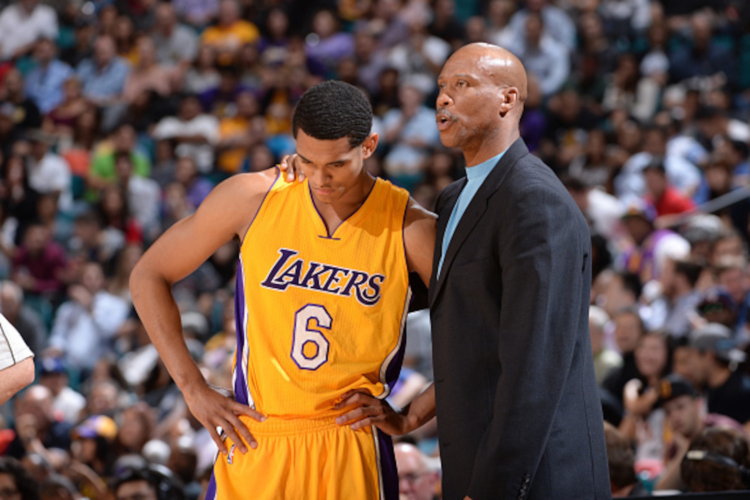 LAS VEGAS, NV - OCTOBER 24: Head coach Byron Scott of the Los Angeles Lakers speaks to Jordan Clarkson #6 of the Los Angeles Lakers during a game against the Sacramento Kings on October 24, 2014 at the MGM Grand Garden Arena in Las Vegas, Nevada. NOTE TO 